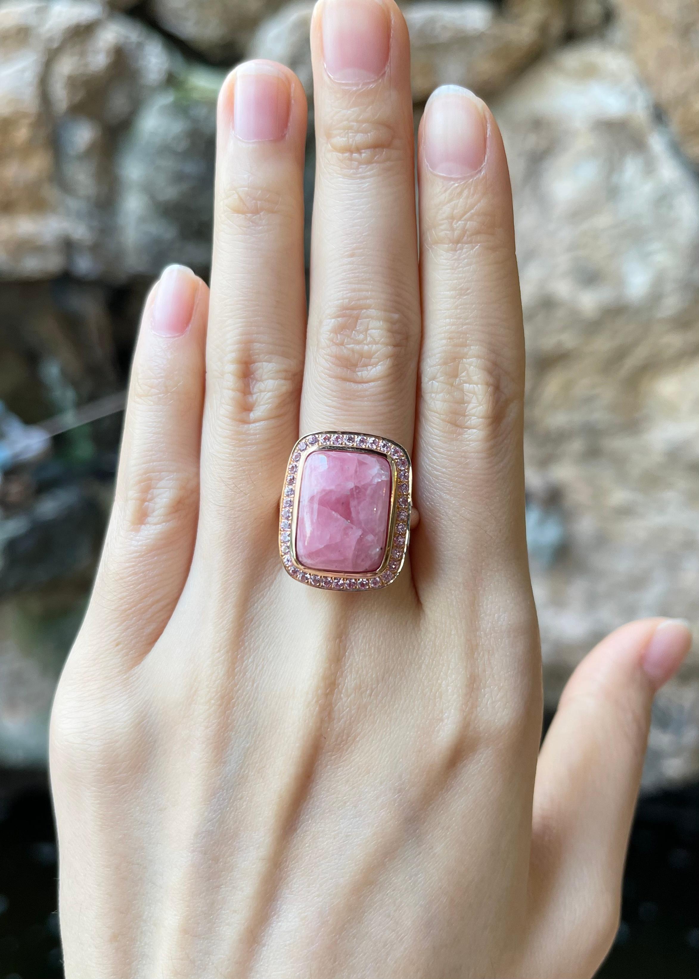 Rhodochrosite 15.56 carats with Pink Sapphire 0.77 carat Ring set in 18K Rose Gold Settings

Width: 1.7 cm 
Length: 2.2 cm
Ring Size:  53
Total Weight: 11.78 grams

