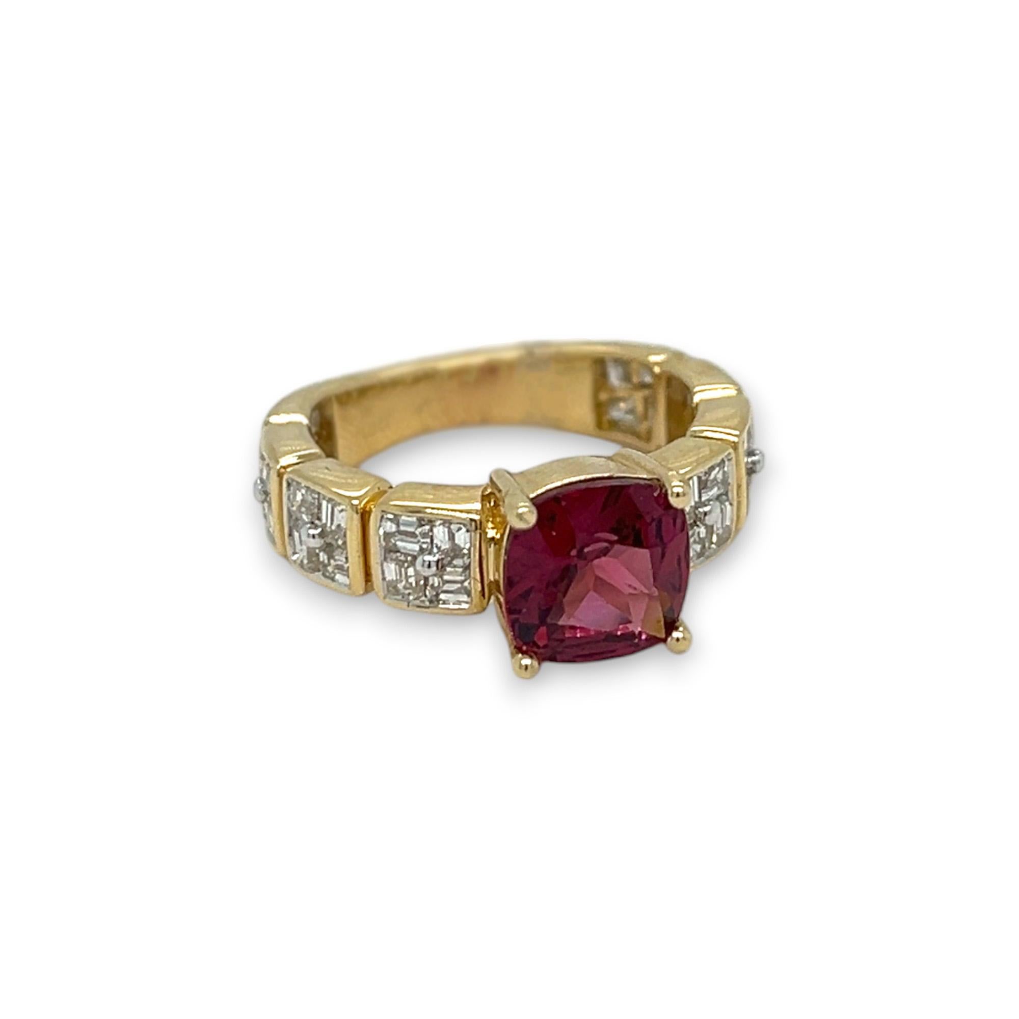 This ring features a 2.57 carat Rhodolite garnet center stone set on a 14k yellow gold band. The band is embellished by 1.78 total carats of emerald cut diamonds of H/I color and VS clarity. Ring can be sized upon purchase.