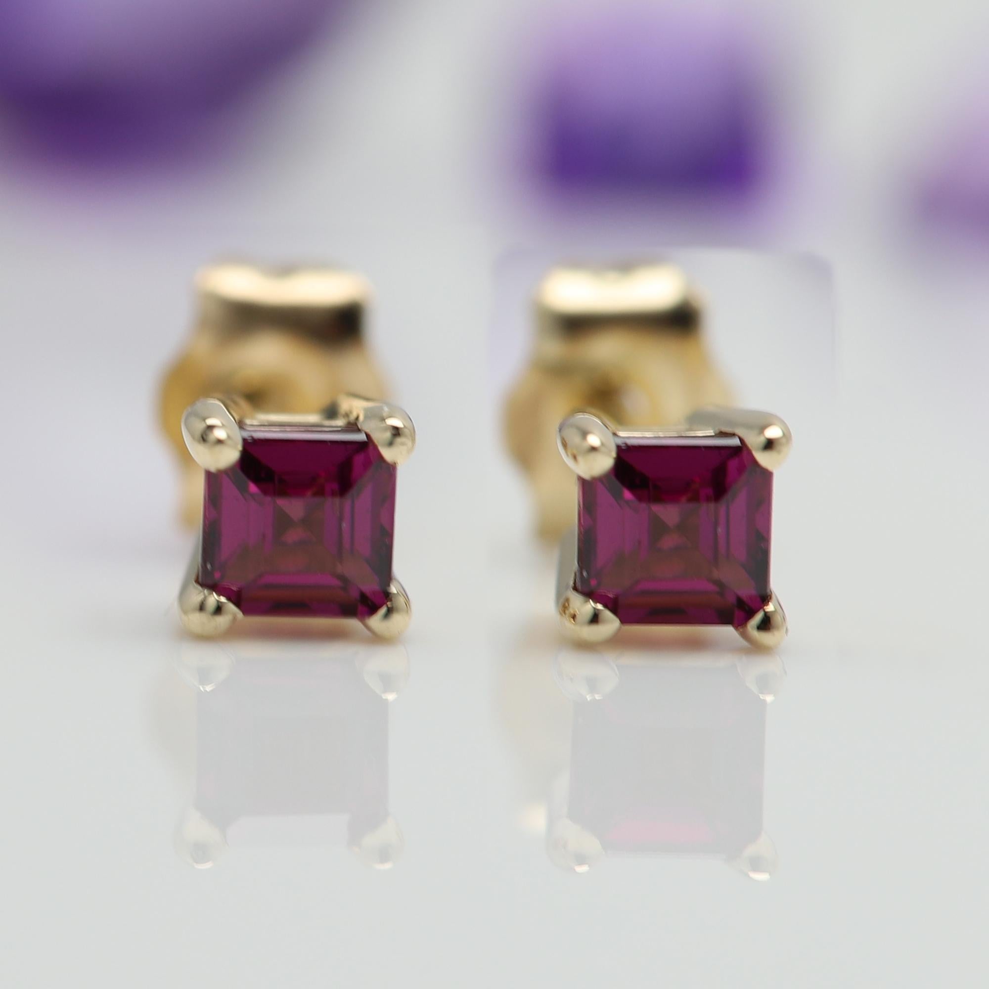 Solid 14k Yellow Gold 
Natural Maroon Rhodolite Gemstone
1 pair ( 2pieces )
each stone is 3.0 mm approx 0.20 carat 
Square shape
AA Quality Gems
due to natural formations minor inclusions or imperfections may occur
Good for any age
+Gift Box
