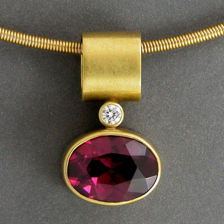18k Royal Yellow Gold Rhodolite Garnet Diamond Handmade Pendant - Elevate your luxury jewelry experience with our bespoke, handcrafted Rhodolite Garnet Pendant. This exquisite piece showcases a mesmerizing 2.2ct Rhodolite Garnet, cradled in the
