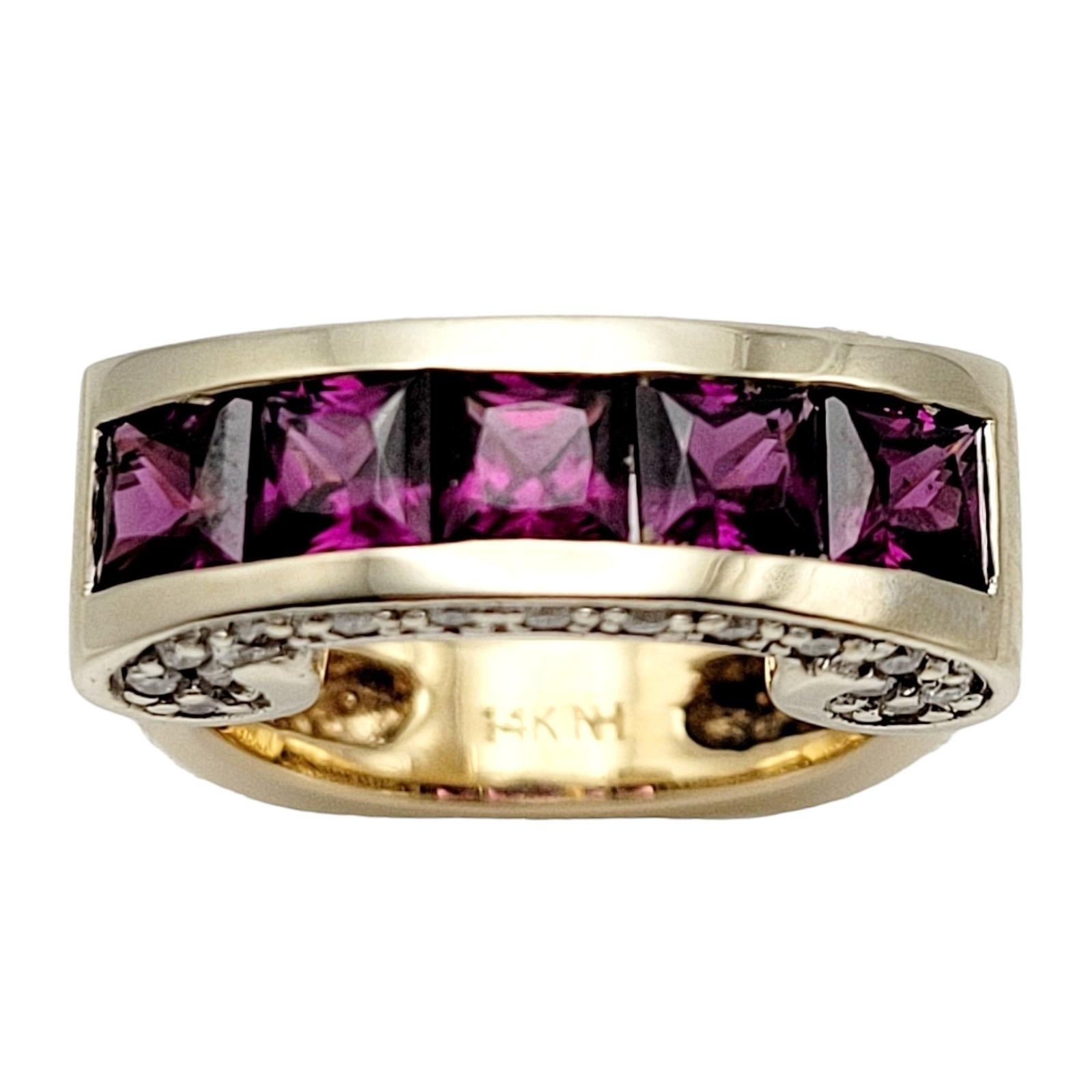We absolutely adore this striking and elegant piece of fine jewelry- a  14 karat yellow gold rhodolite garnet and diamond ring. Meticulously crafted with attention to detail, this mesmerizing and unique piece is destined to be a cherished addition