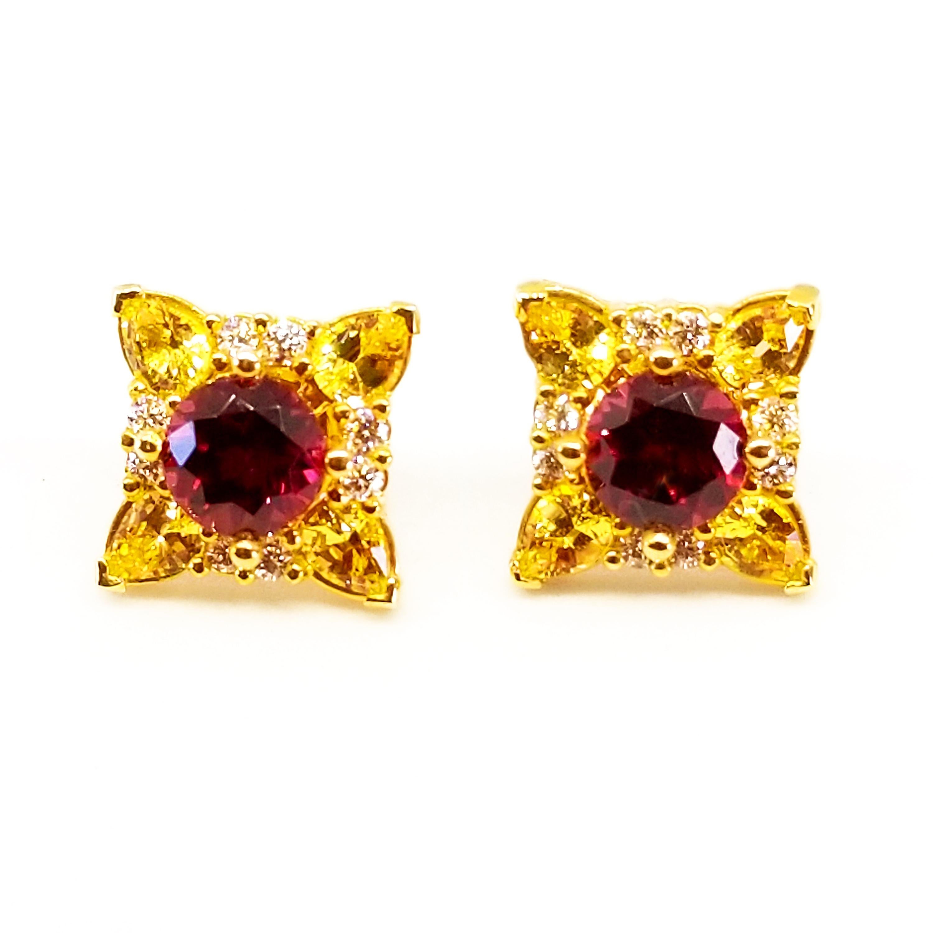 This Colorful pair of Cluster Floret Earrings in Deep Red and Yellow feature Round Brilliant cut, natural  Rhodolite Garnets of 6mm each and 2.20 Carats combined weight. The Gem Quality stones are of vibrant Red hue and are prong set. Surrounding