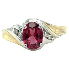 Bague en or bicolore 14K avec grenat rhodolite et diamant