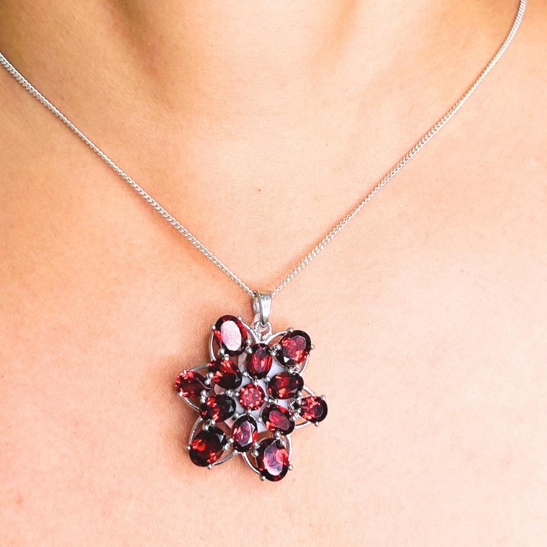 Rhodolite Garnet Gemstone Star Style Pendant in sterling silver studded with round cut garnet. This stunning piece of jewelry instantly elevates a casual look or dressy outfit.
Garnet enhances the intellectual capacity of the person.
Designed with