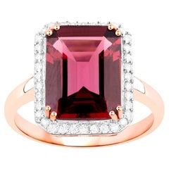 Anello con granato rodolite e diamanti 5,97 carati in oro rosa 14K