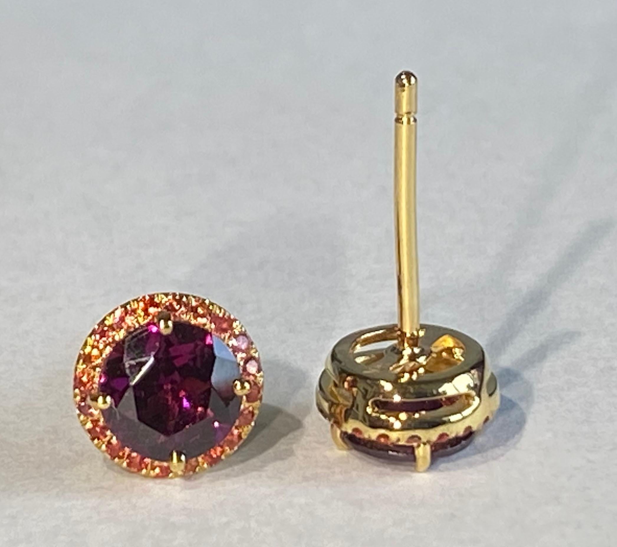 Round Cut 14Kt Yellow Gold Earrings set with Rhodolite Garnet & Orange Sapphire For Sale