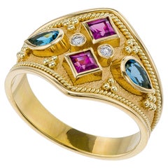 Bague byzantine avec topaze rhodolite et diamants