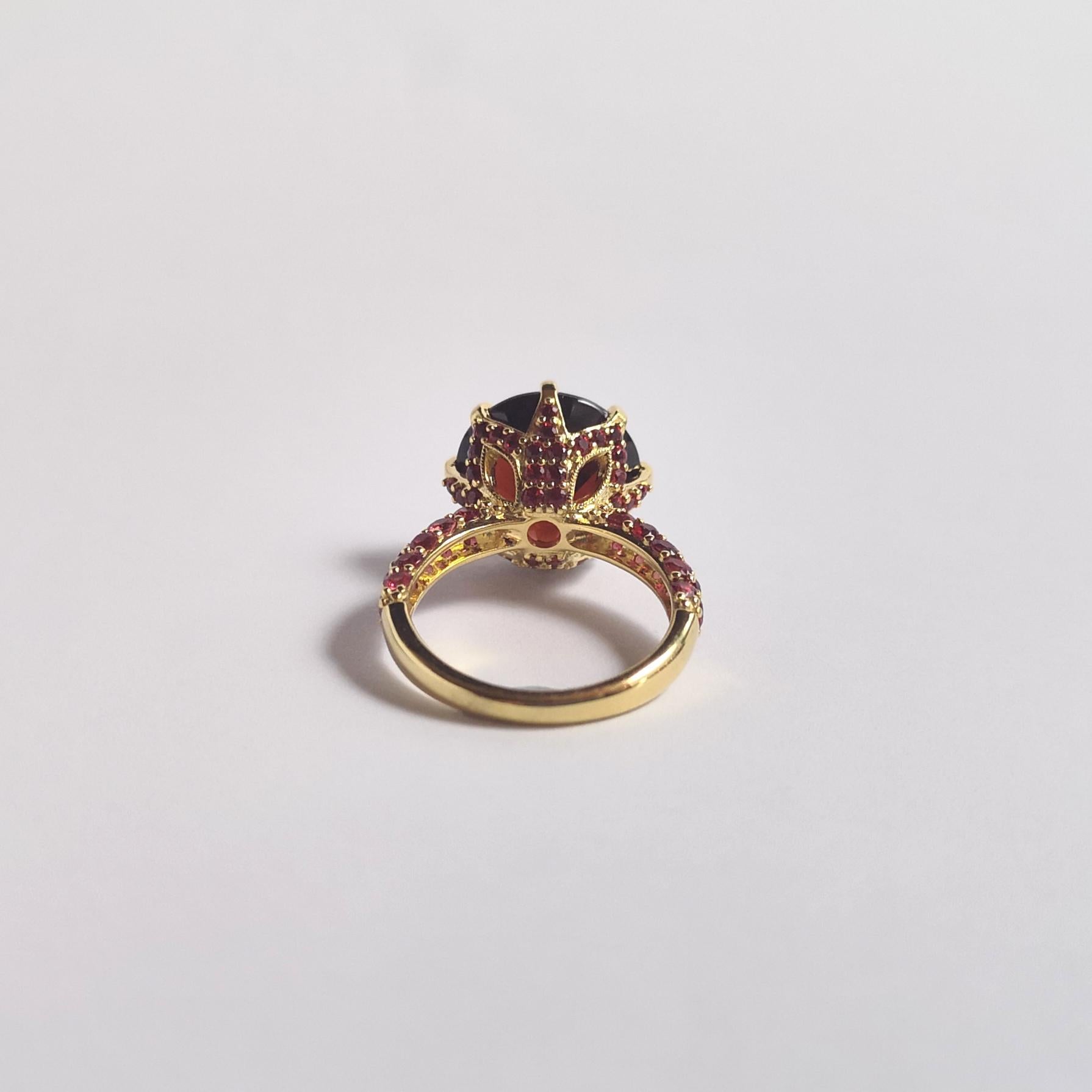 Bague en rhodolite et saphir orange sertie dans des montures en or 18 carats en vente 5
