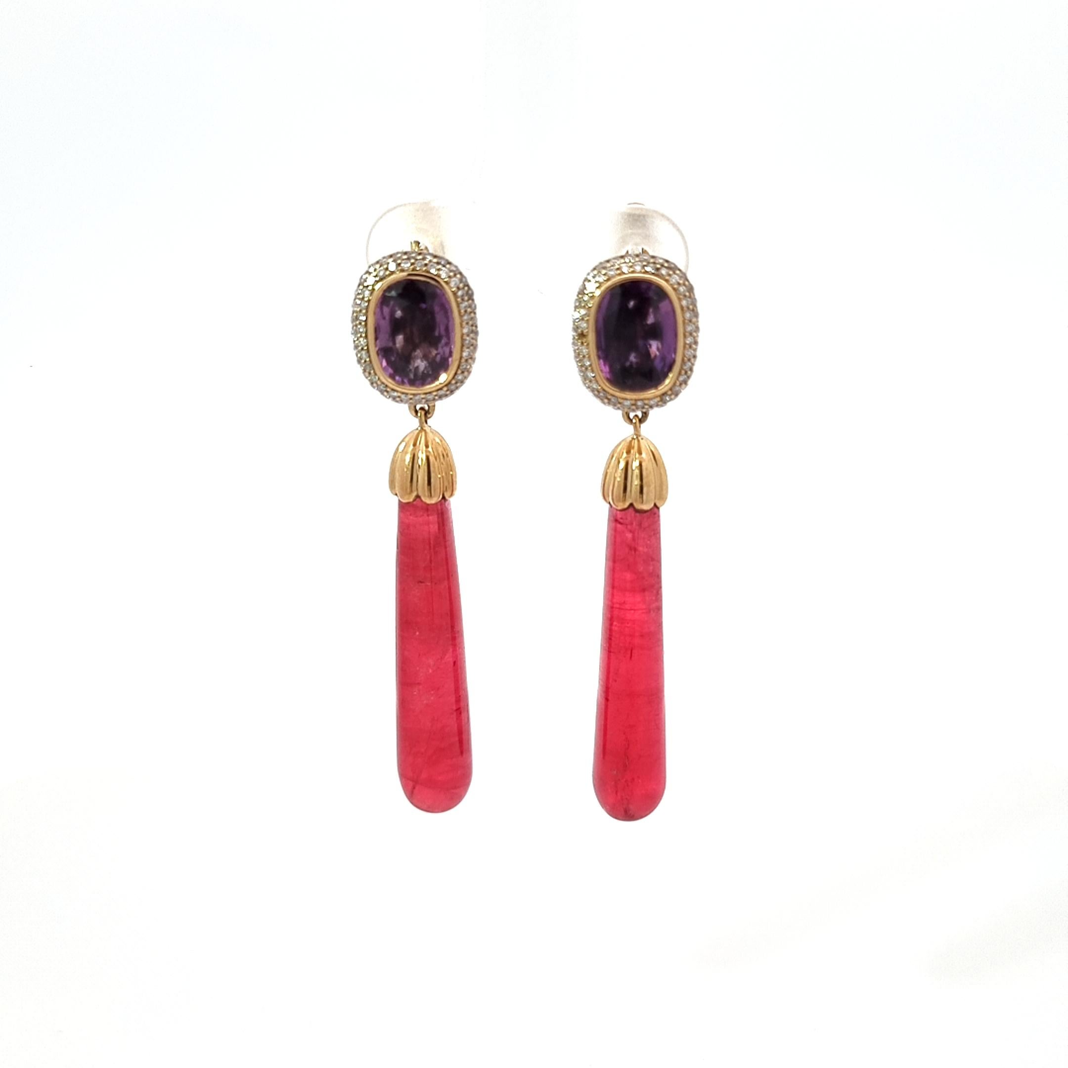 Summer Night Collection by VOTIVE.

Elevate your elegance with VOTIVE's Rhodonite Yellow Gold Drop Earrings from the exquisite Summer Night Collection. Crafted in radiant yellow gold, these earrings exude the warmth and glow of summer evenings. The