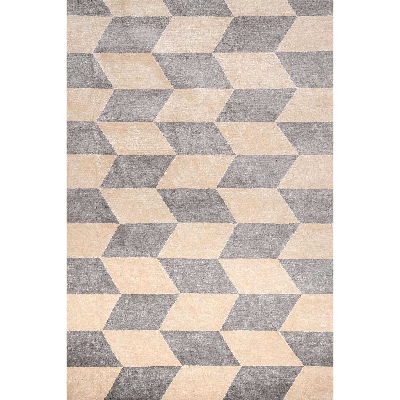 Customizable in size, material composition and coloring, this stylish rug is hand crafted in India in pure Chinese silk using a Tibetan knotting technique (100 knots per square inch). Featuring the warp and weft in high quality cotton, this carpet