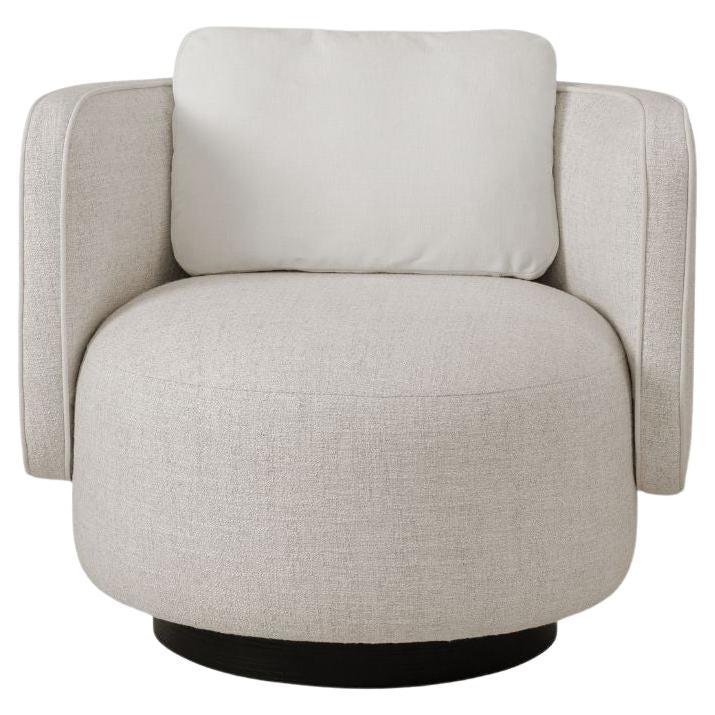RHONDA Contemporary Swivel Lounge Chair Featuring Soft Curves and Tailored Finis