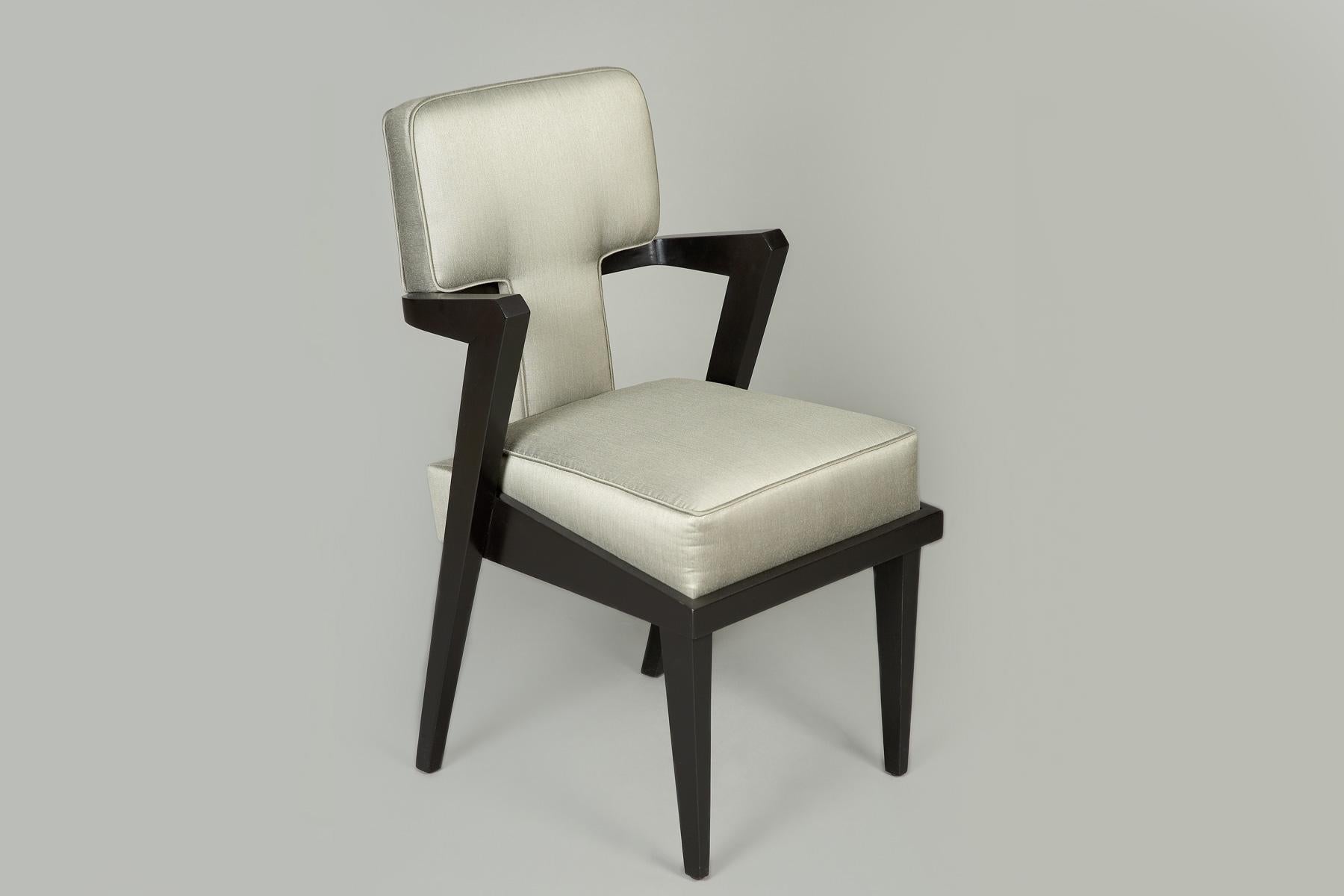 Wood Frame Arm Chair with wrap around upholstery.