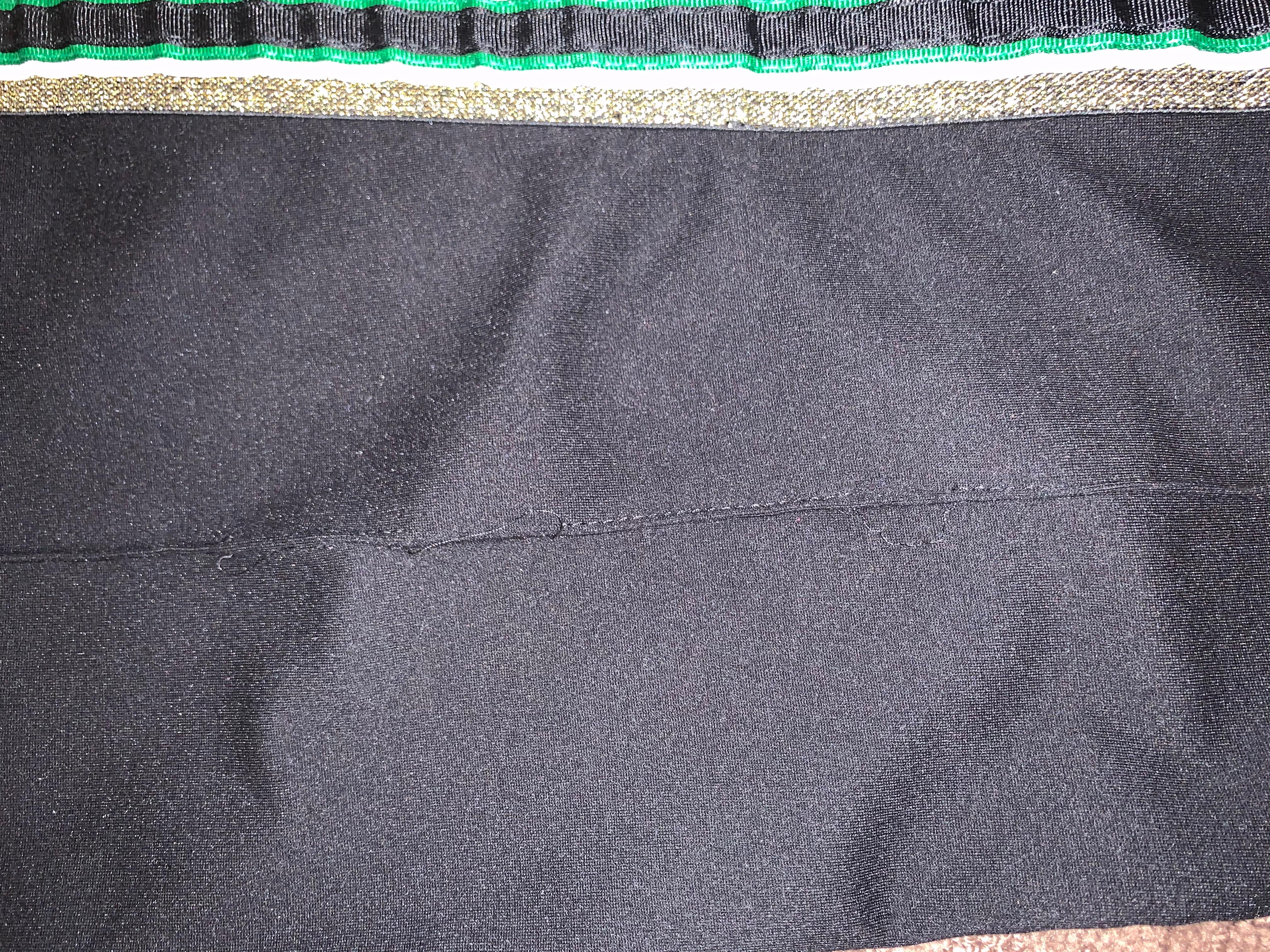 black pants green stripe