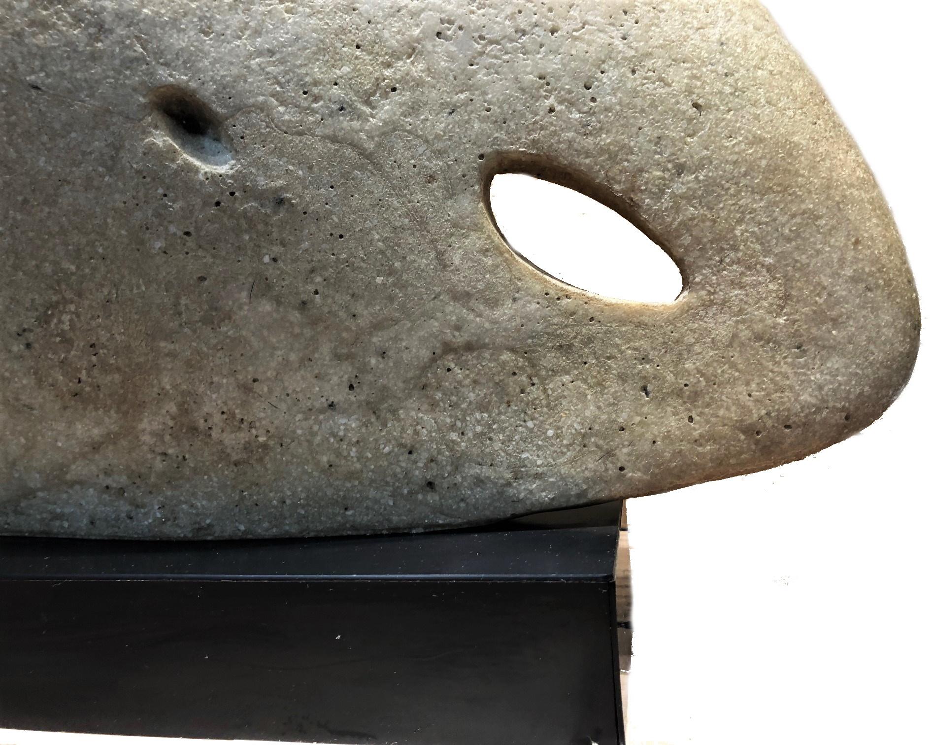 This very unusual American Mid-Century Modern cast stone sculpture by Rhys Caparn, 