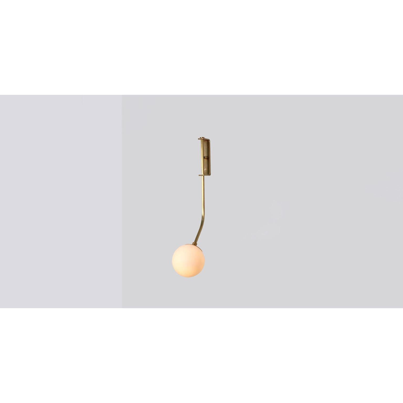 Rhythm Glass Globe Wall Sconce by Lamp Shaper
Dimensions: D 35.5 x W 29 x H 61 cm.
Materials: Brass and glass.

Different finishes available: raw brass, aged brass, burnt brass and brushed brass Please contact us.

All our lamps can be wired