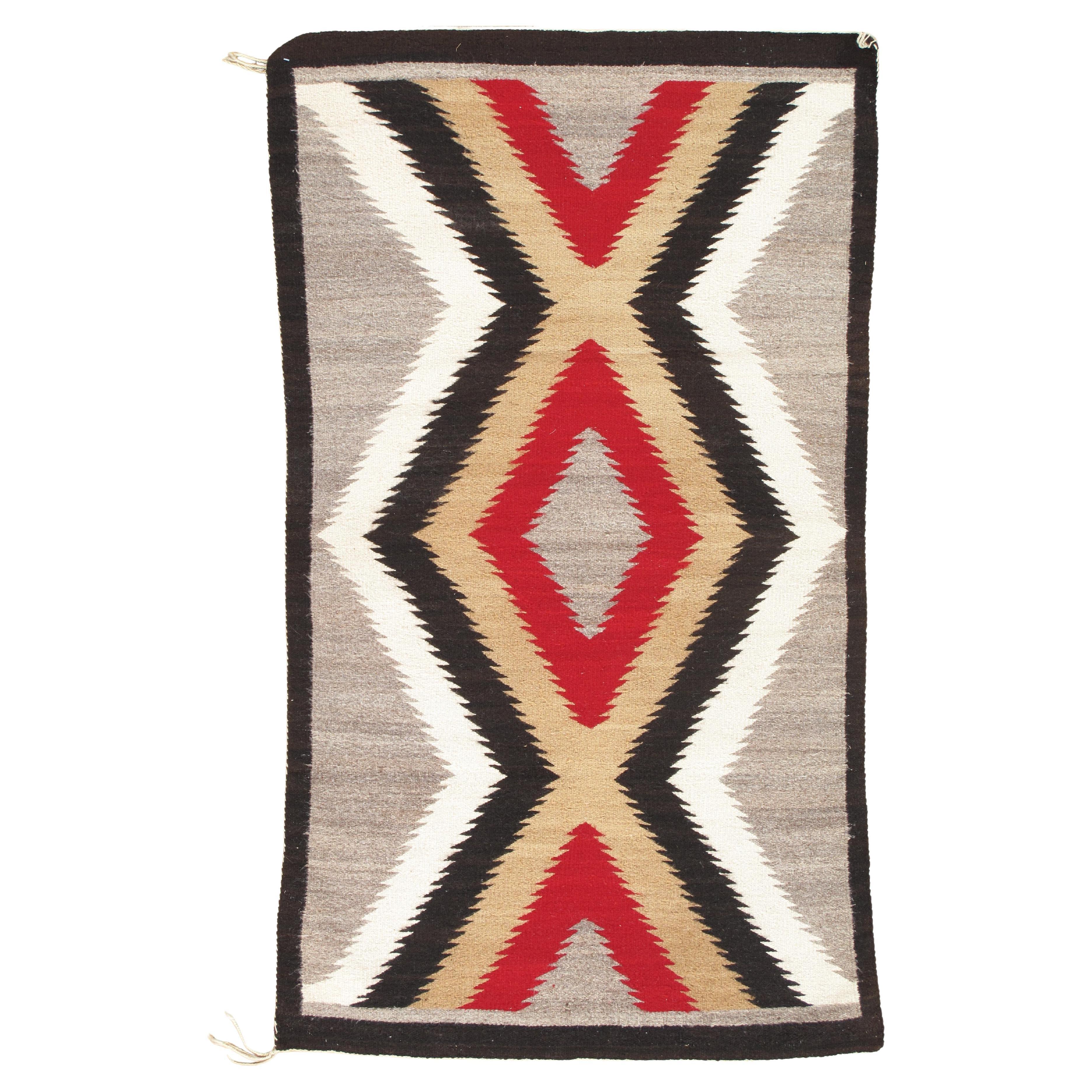 Rhythm of the Four Directions: A Mid-20th Century Navajo Chevron Rug, Handmade im Angebot
