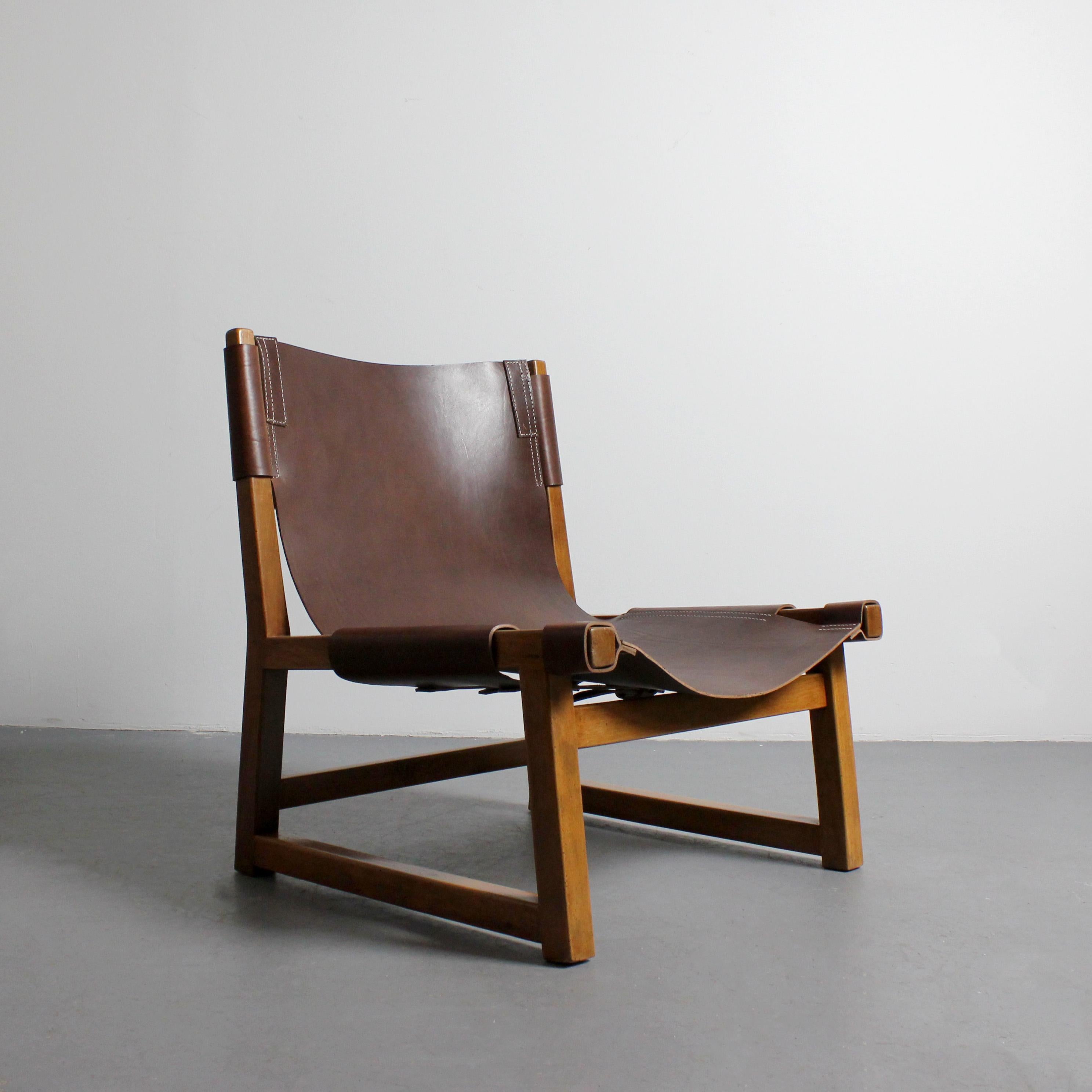 Riaza Sessel mit Nussbaumgestell und Lederpolsterung - Paco Muñoz - a Darro - um 1960 - Spanien

Abmessungen: 67 x 60 x 60 cm