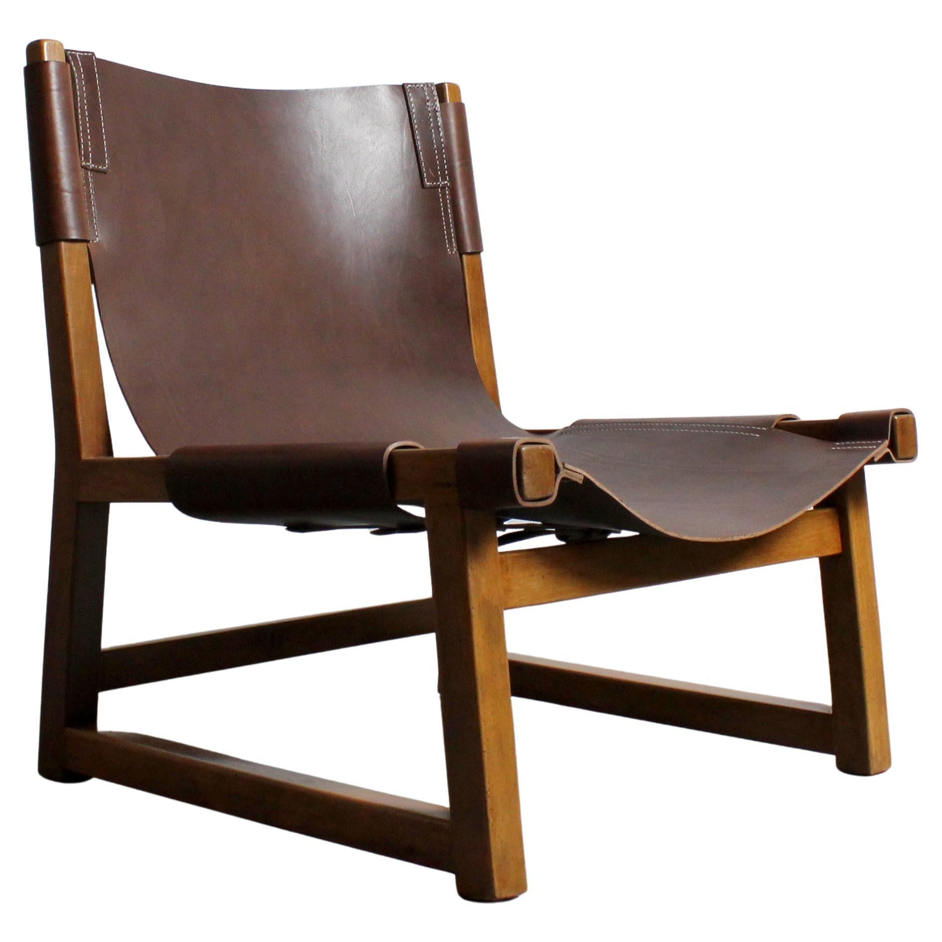 Riaza armchair with walnut frame and leather upholstery - Paco Muñoz - a Darro -