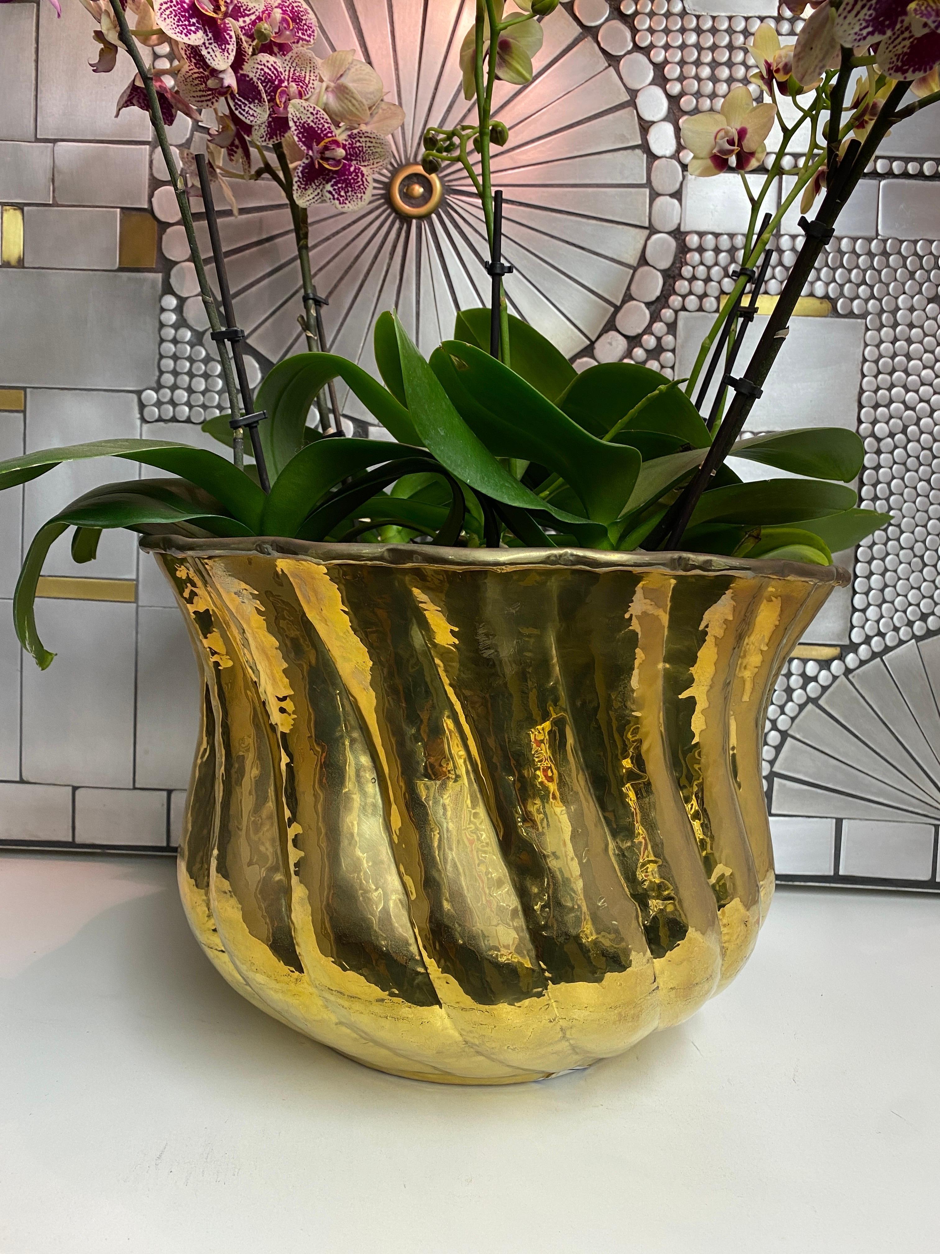 Hand hammered ribbed brass planter. Never used old inventory from 1980s. Two available. Price is per planter.
