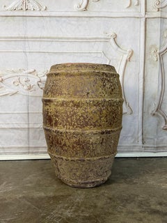 Ribbed Terracotta Storage Vessel with Ochre Encrusted Patina
