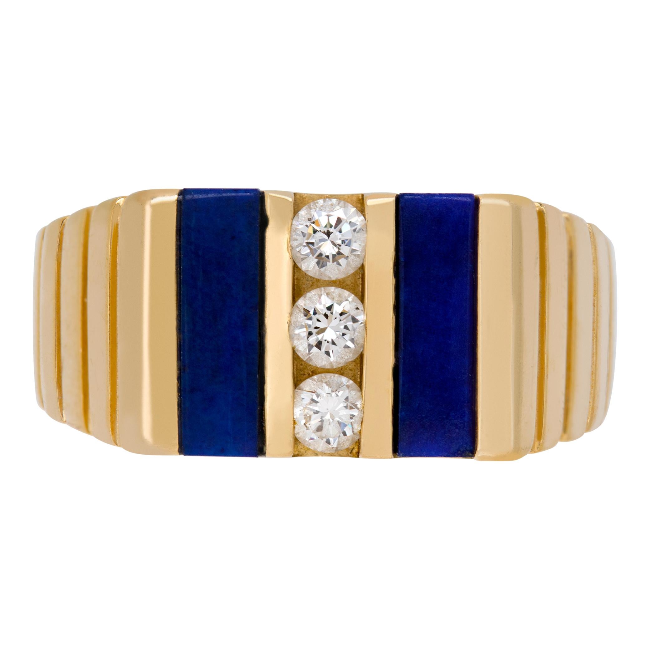 Ribbed 14k yellow gold ring with approximately 0.30 carat in channel set diamonds & bilateral lapiz lazuli accents. Size 9, measures 10mm thick.This Diamond ring is currently size 9 and some items can be sized up or down, please ask! It weighs 6.7