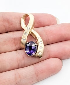 Colgante Cinta Amatista y Diamante en Oro Amarillo de 14k