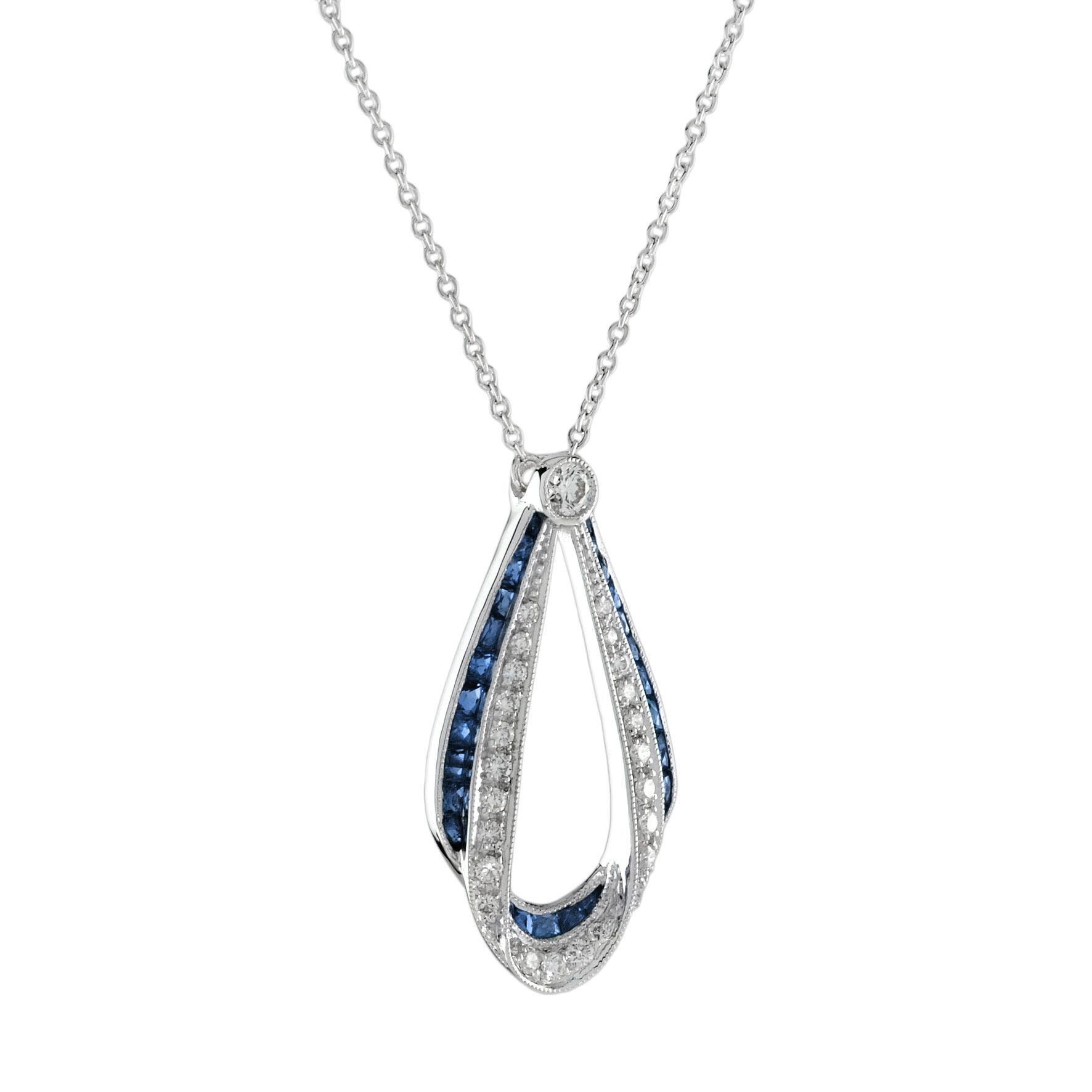 This Art Deco style pendant necklace is absolutely stunning, extraordinary. Over 2 carats of vivid and exceptional blue sapphires border the edge of pendant. And 0.43 carats of fine diamonds. Artful and precise work combine with masterful stone