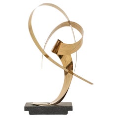 Scultura in ottone a nastro firmata "MC
