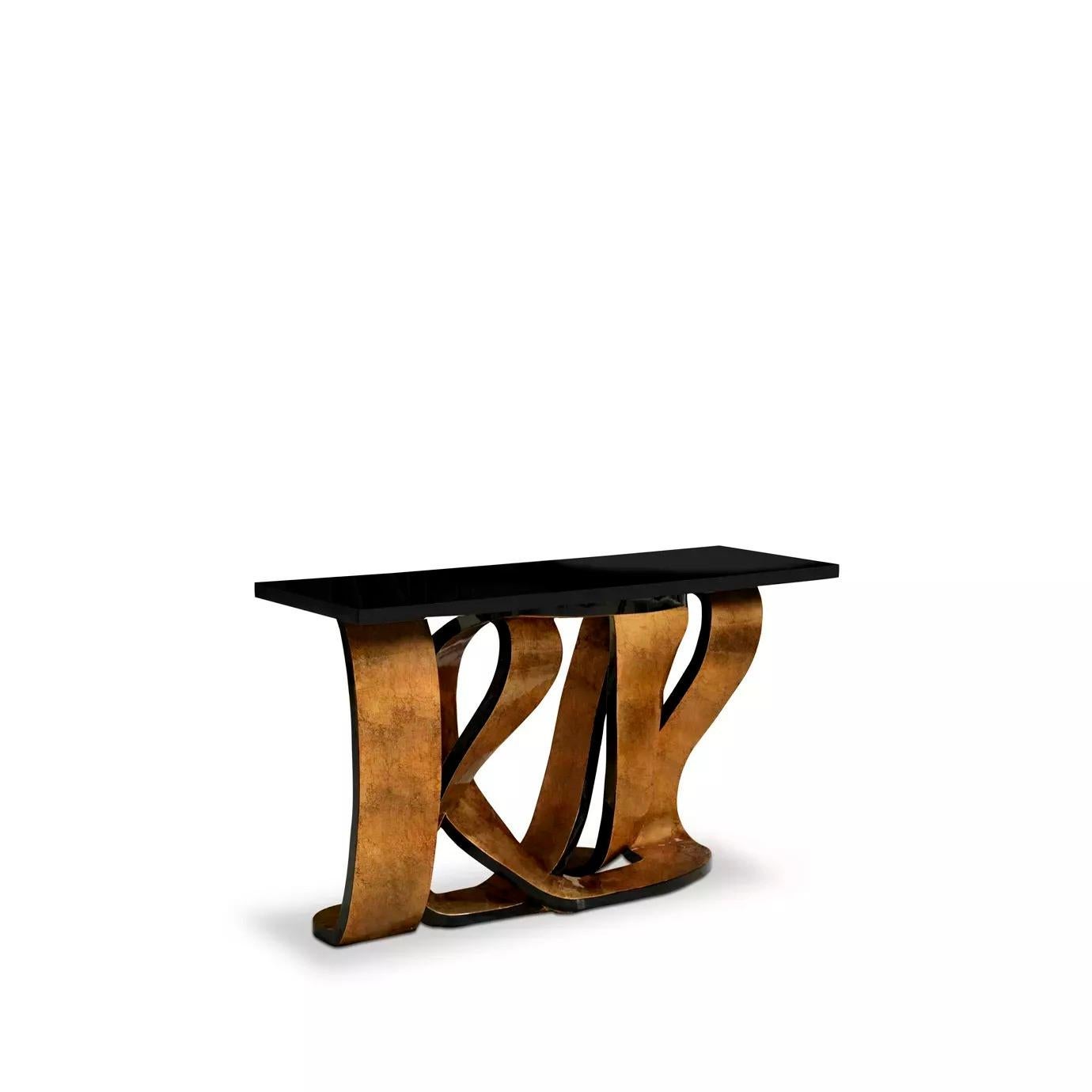 Get wrapped up in the rhythmic design of the Ribbon console table. The provocative twists and turns of the base are delicately adorned in gleaming metallic leaf, mimicking the sheen of a girl's hair ribbon. The luxury console table's playful base is