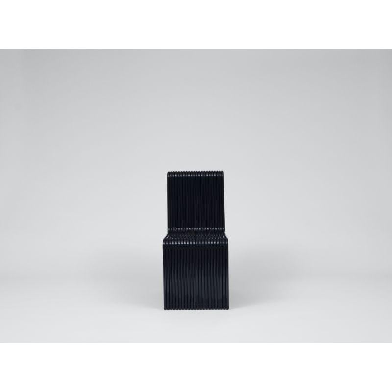 Ribbon Chair, Black by Laun ( Handmade in Los Angeles )
Ribbon Collection
Dimensions: H.89 D.65 W.42 cm
Materials: Powdercoated Aluminum

Also Available: Ribbon Stool, Ribbon Lounge Chair, custom sizing, and finishes upon request, please contact