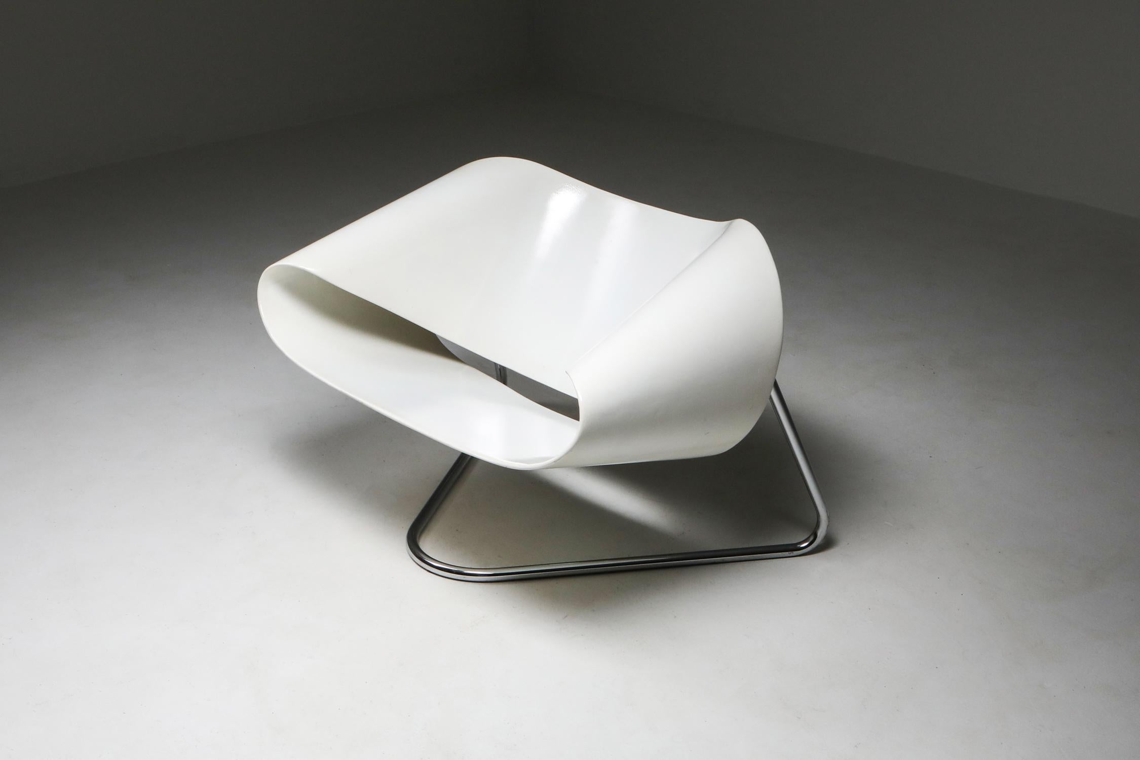 Ribbon chair; Model CL9; Cesare Leonardi; Franca Stagi; Bernini; 1961; Italy; Italian design; white fiberglass; 

This iconic piece is designed by Cesare Leonardi & Franca Stagi and manufactured by Bernini in Italy in 1961. The name 