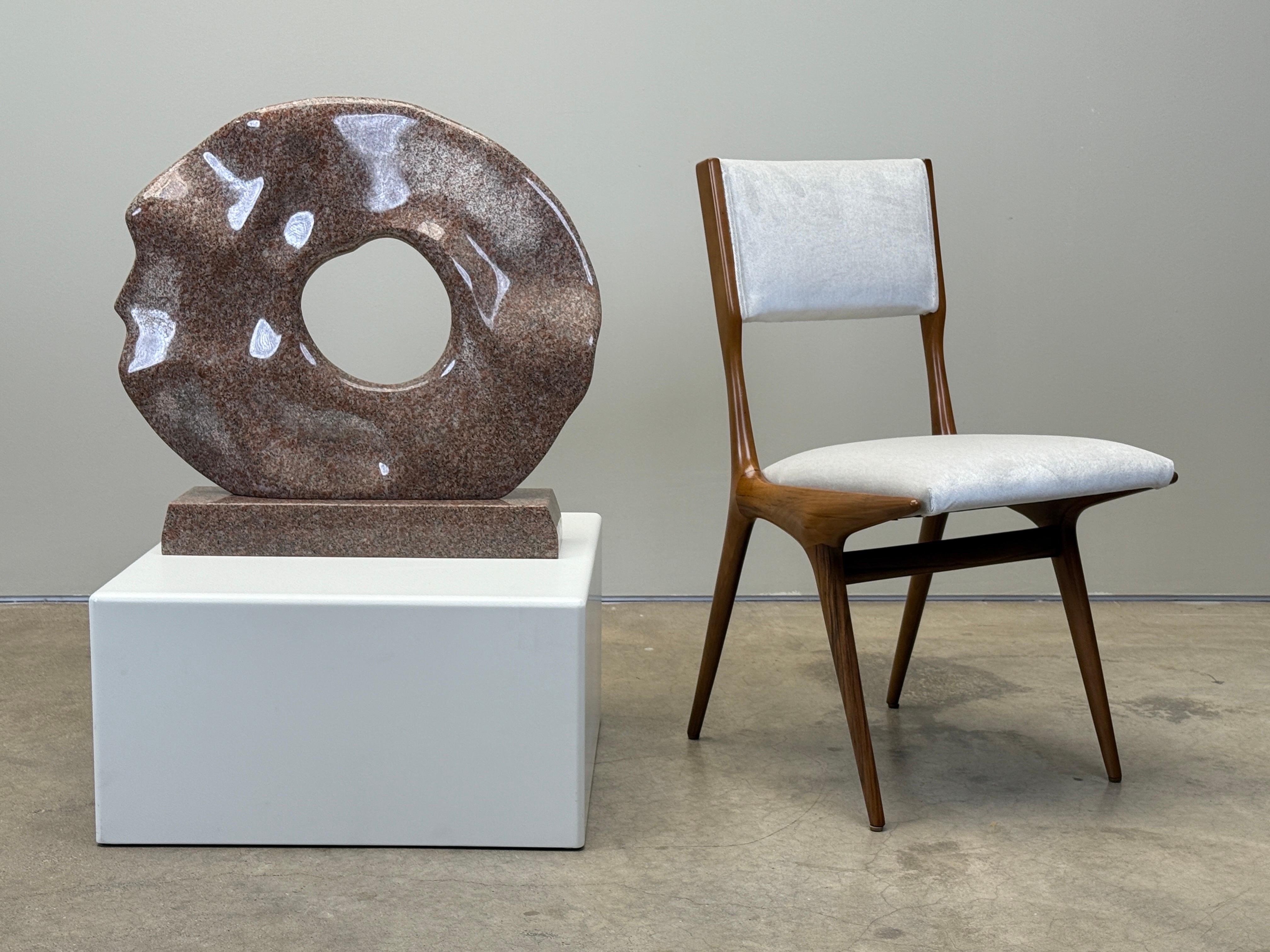 Carved from red granite, 