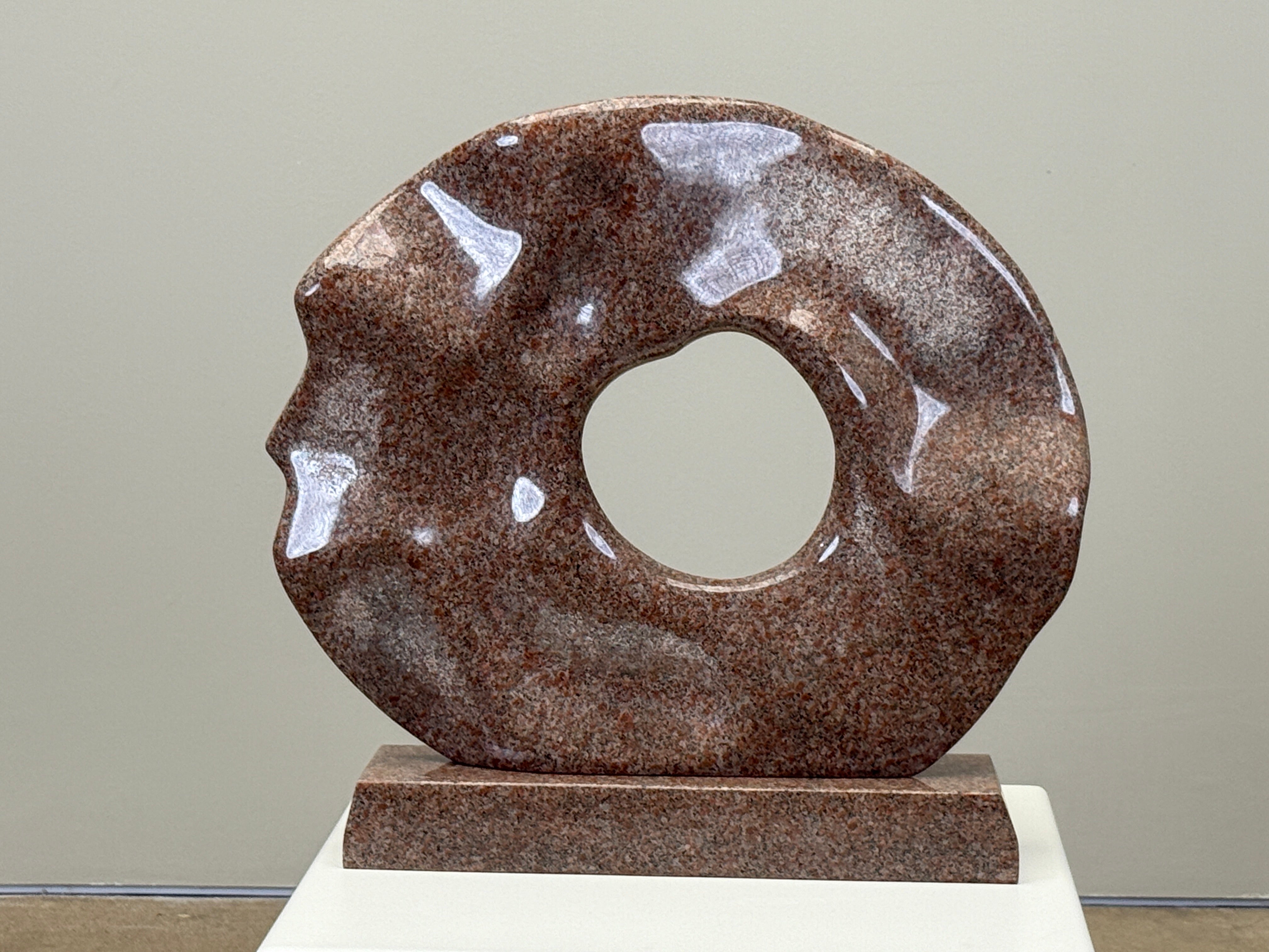 Carved 'Ribbon Disc' Granite Sculpture by Robert Winslow For Sale
