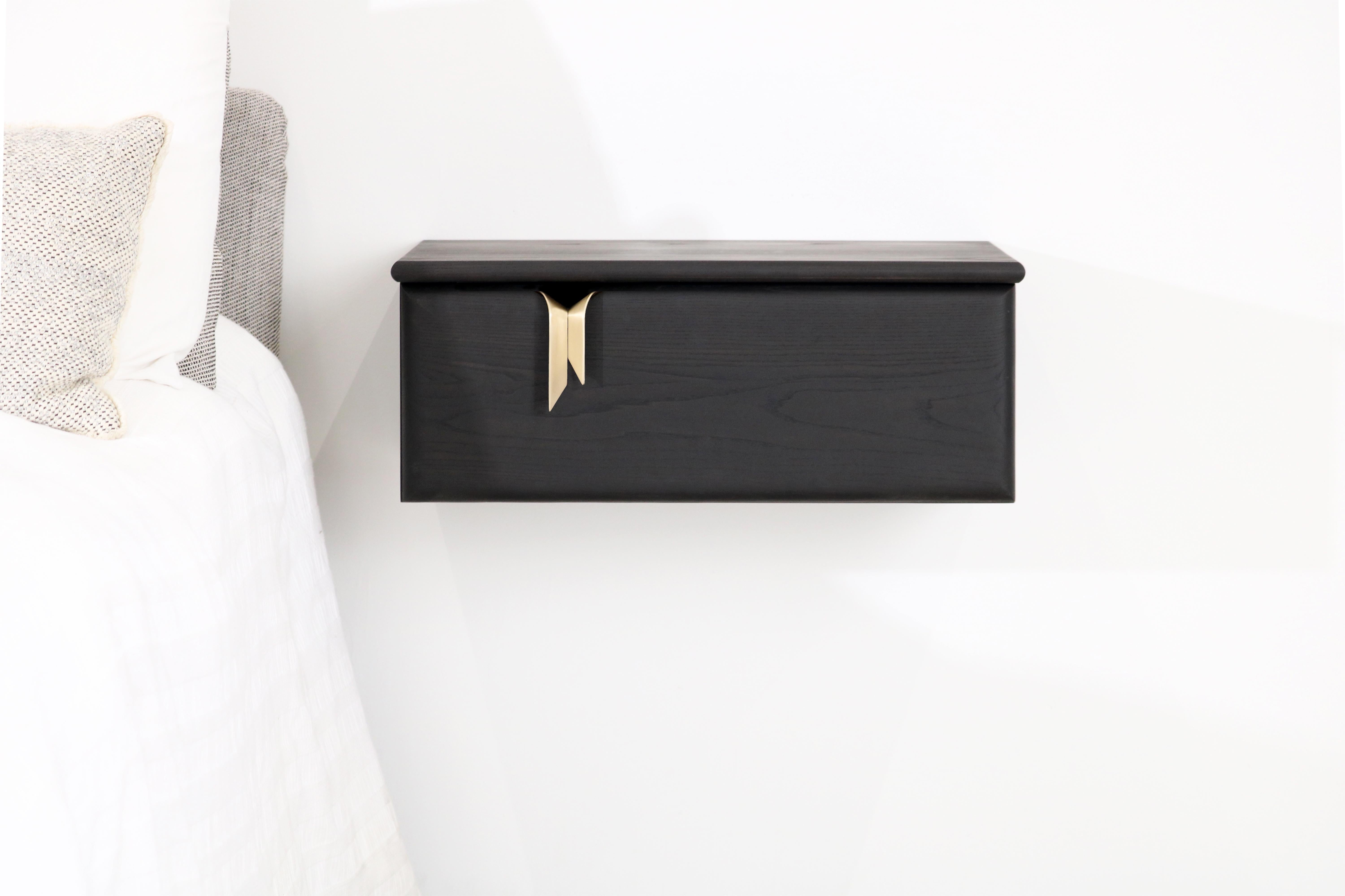 An interest in the translation of textile languages and soft surfaces through furniture forms has led to the development of a unique hardware and storage collection. Inspired by ribbons and communicated through hand cast solid bronze hardware and