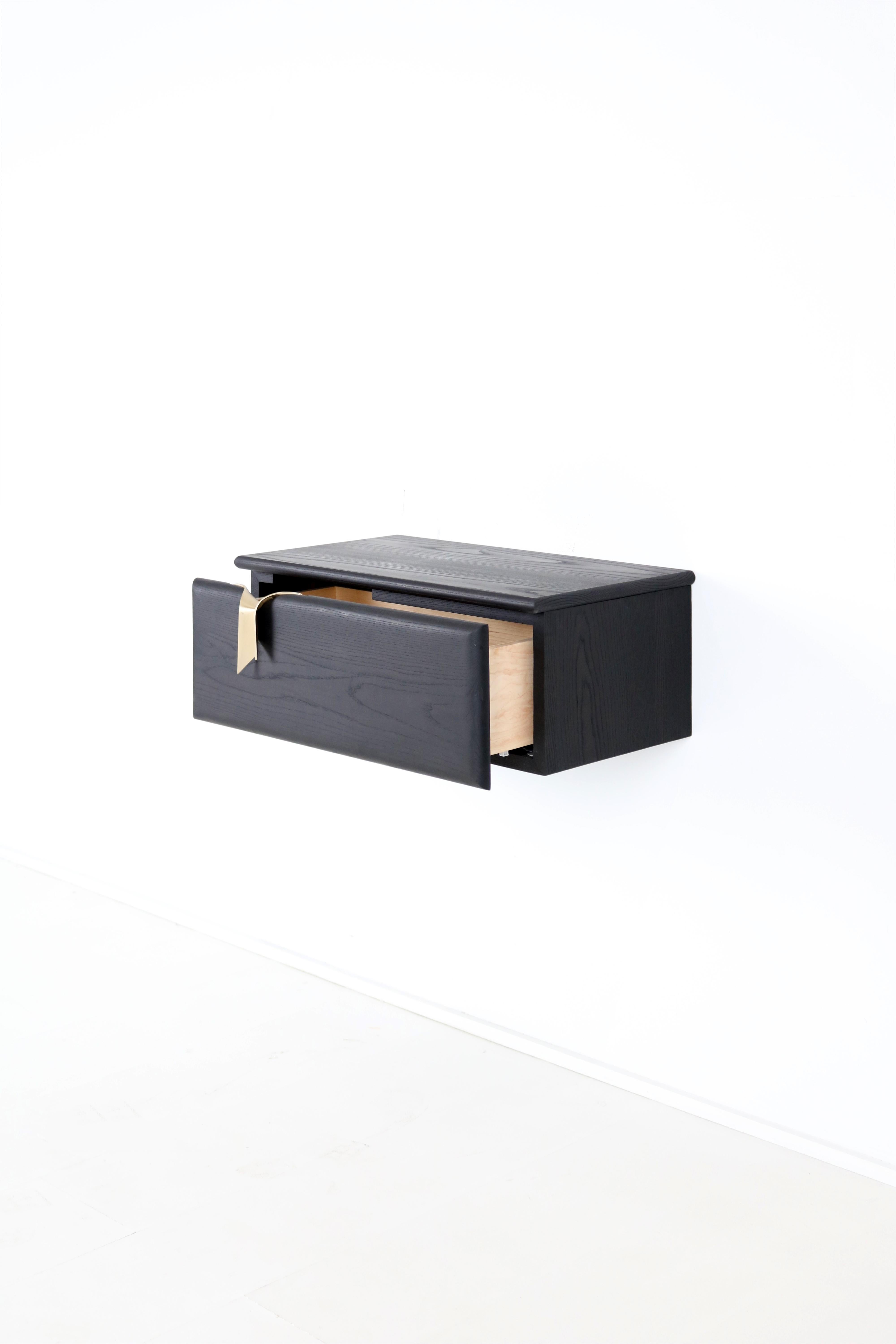 black wall mounted bedside table
