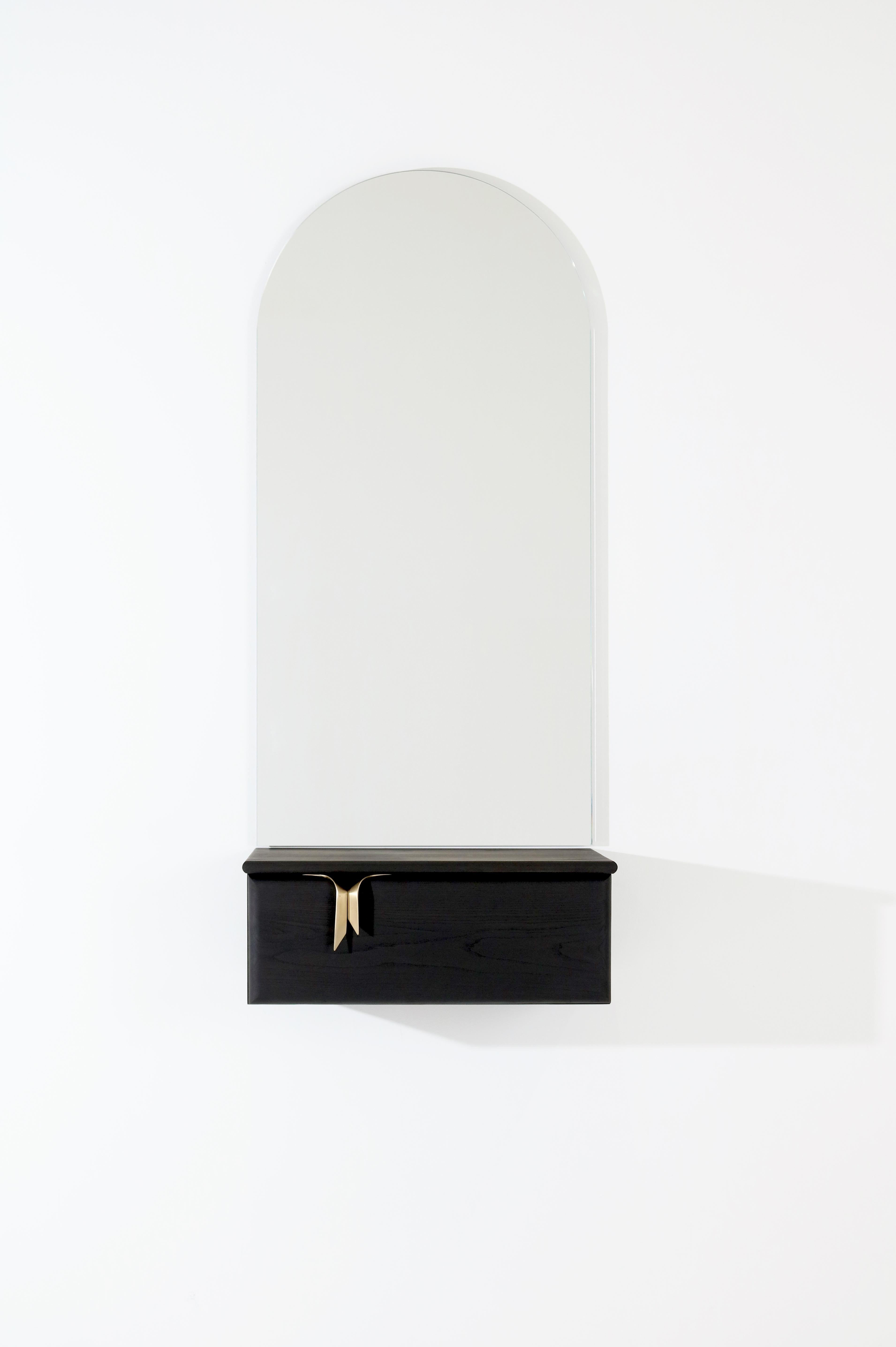 An interest in the translation of textile languages and soft surfaces through furniture forms has led to the development of a unique hardware and storage collection. Inspired by ribbons and communicated through hand cast solid bronze hardware and