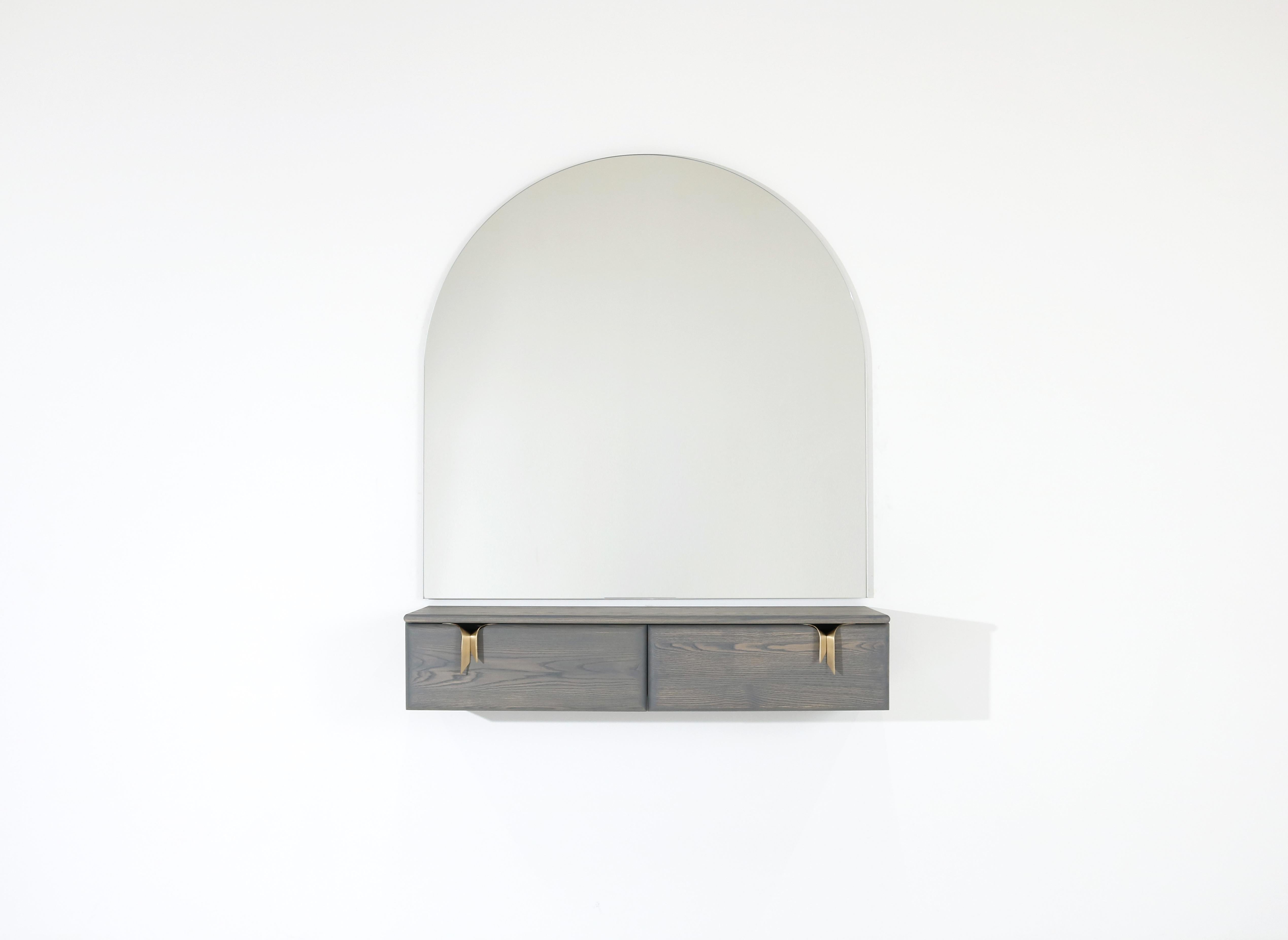 An interest in the translation of textile languages and soft surfaces through furniture forms has led to the development of a unique hardware and storage collection. Inspired by ribbons and communicated through hand cast solid bronze hardware and