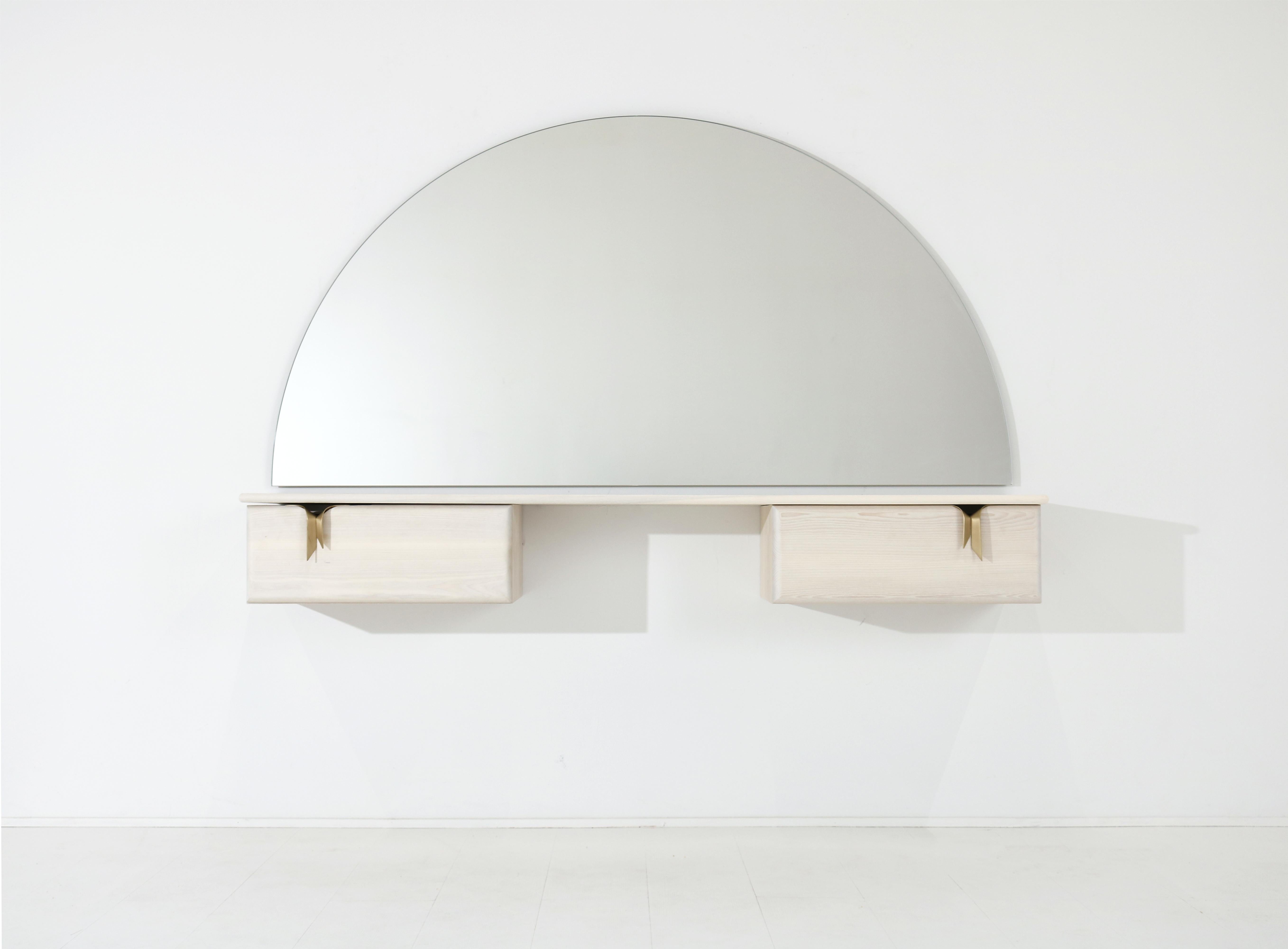 An interest in the translation of textile languages and soft surfaces through furniture forms has led to the development of a unique hardware and storage collection. Inspired by ribbons and communicated through hand cast solid bronze hardware and