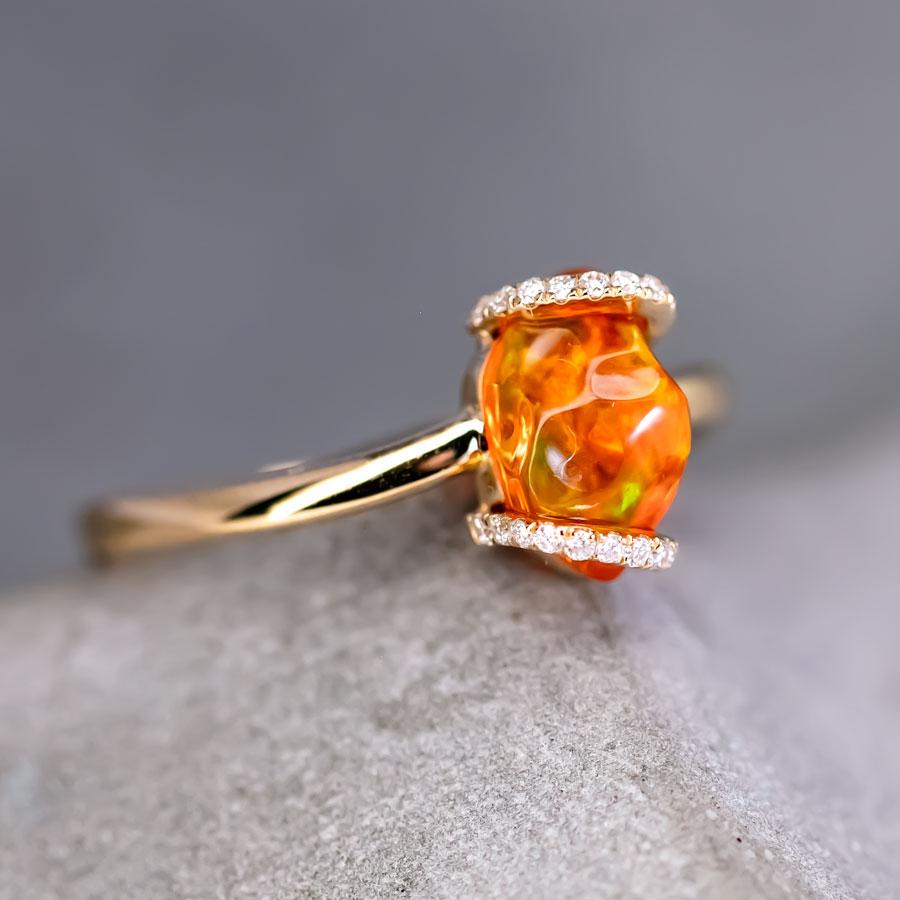 Ribbon Wrap Design Mexican Fire Opal Diamond Engagement Wedding Ring in 18K Yellow Gold.



Free Domestic USPS First Class Shipping! Free Gift Bag or Box with every order!



Opal—the queen of gemstones, is one of the most beautiful gemstones in the