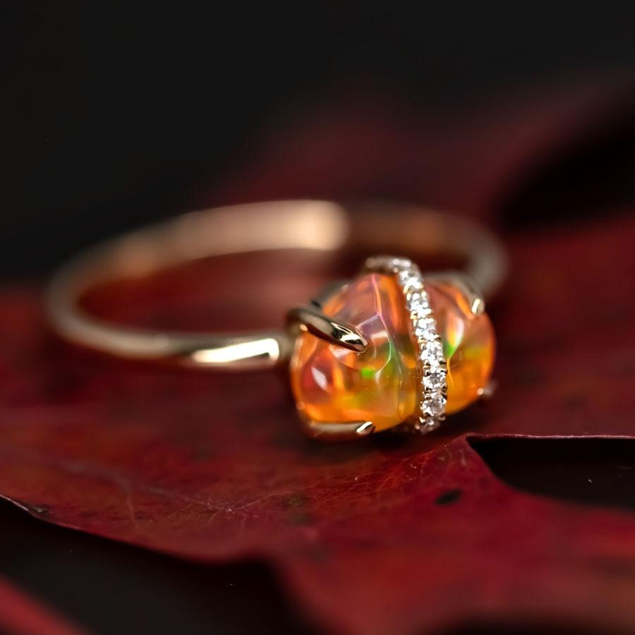 Band gewickelt mexikanischen Feuer Opal Diamant Verlobungsring 18K Gelbgold.



Kostenloser Inlandsversand mit USPS First Class!  Kostenlose einjährige beschränkte Garantie!  Kostenlose Geschenktüte oder -box zu jeder Bestellung!



Der Opal, die