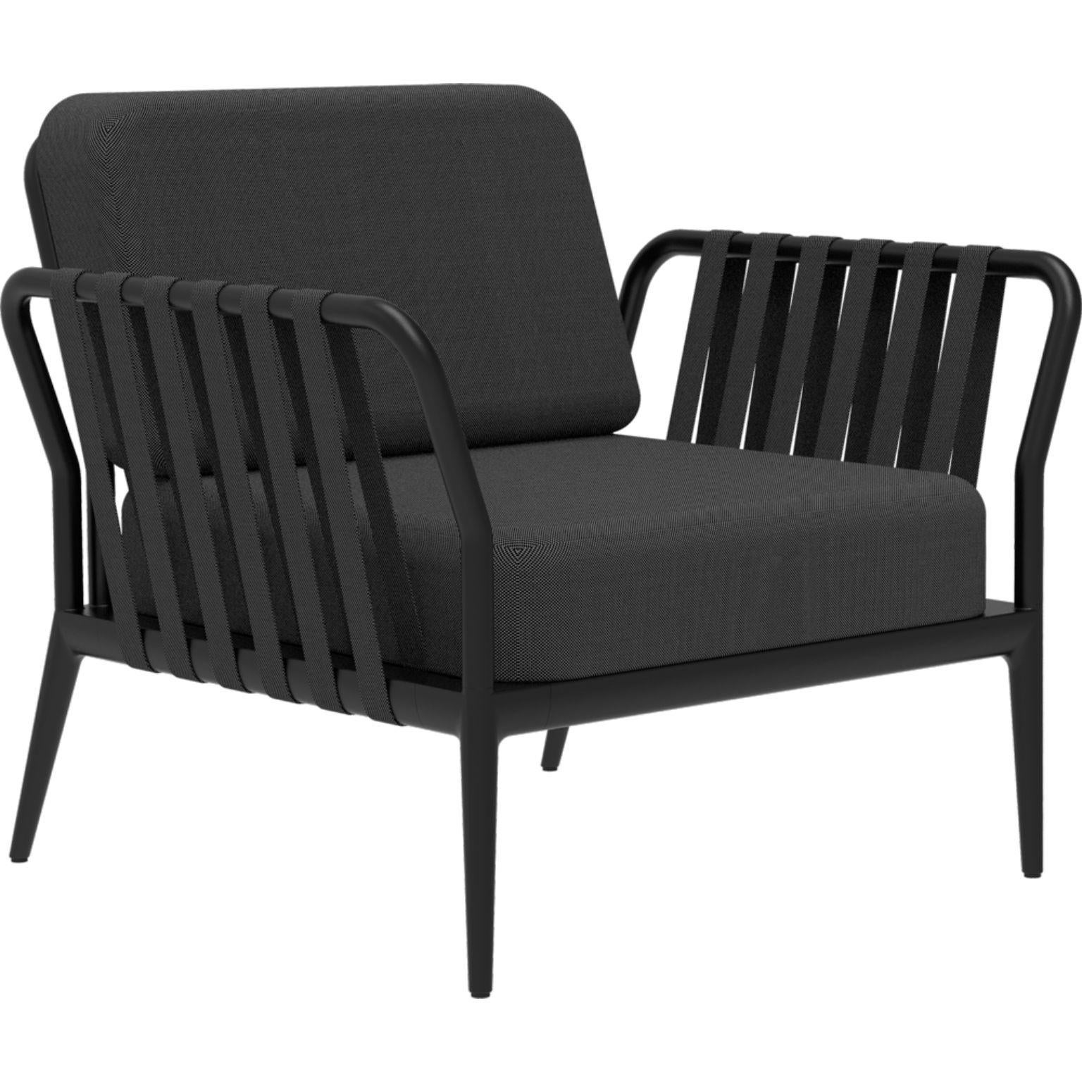 Ribbons black armchair by Mowee.
Dimensions: D83 x W91 x H81 cm (Seat Height 42 cm).
Material: Aluminium, upholstery
Weight: 20 kg
Also Available in different colours and finishes.

An unmistakable collection for its beauty and robustness. A