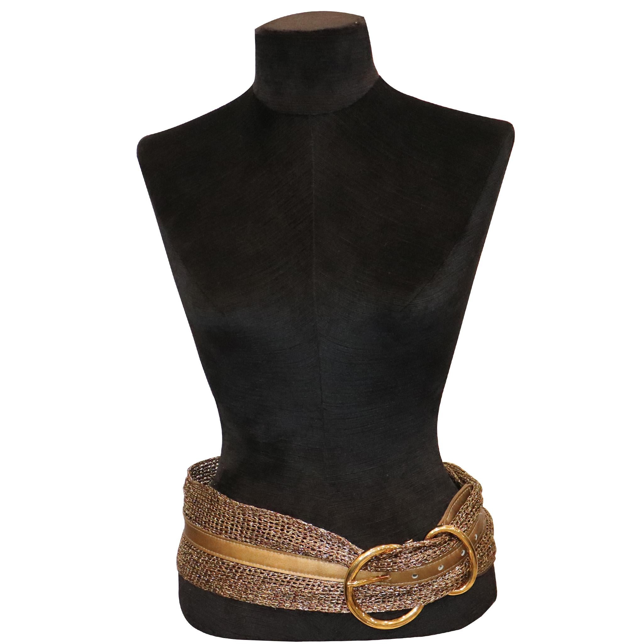 Ribel Gold Mesh Belt W/ Gold Looped Buckle. In excellent condition 

Measurements:

Longest length - 36.25 inches
Shortest length - 31 inches
Width - 4 inches