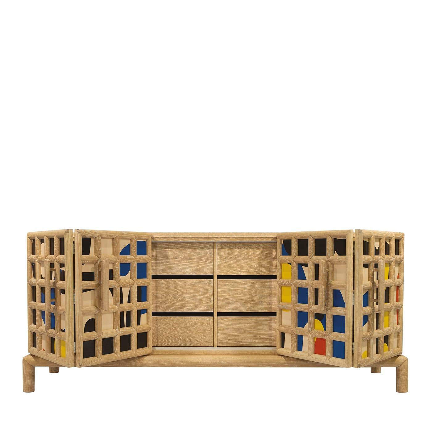 The Ribera sideboard uses traditional painting techniques, combined with highly sophisticated joinery to create an unexpected and surprising piece of furniture. Pickled oak is grafted in the form of a grid adapted for use as handles. The bi-fold