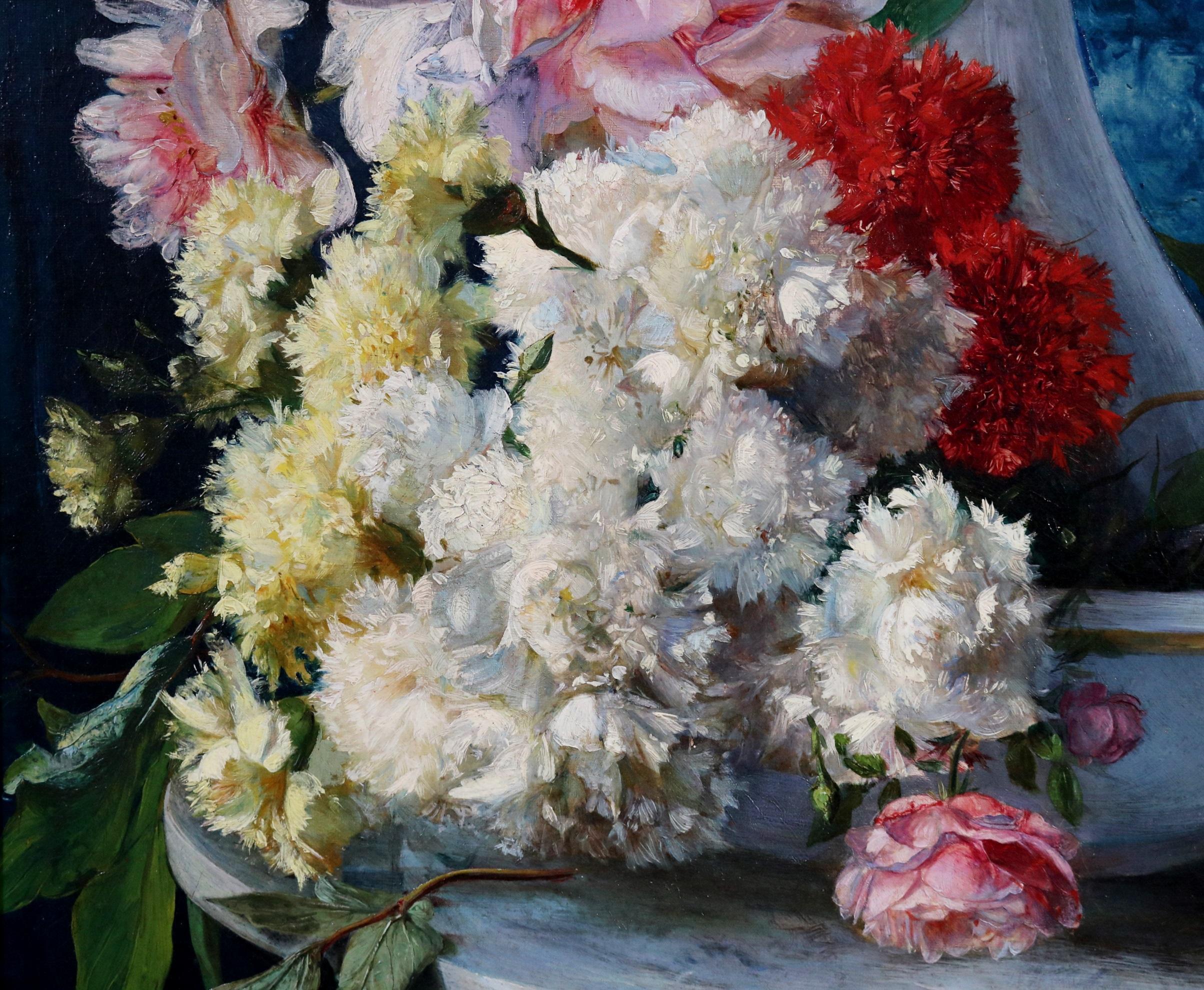 ‘Flores de Verano' by Ricardo Martí Aguiló (1857-1935). The painting – which depicts a summer floral bouquet in an opalescent glass jug on a marble column – is signed by the artist and hangs in a fine quality gold metal leaf frame. 

Academy Fine