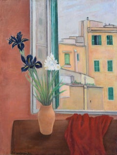 Vaso di fiori davanti alla finestra