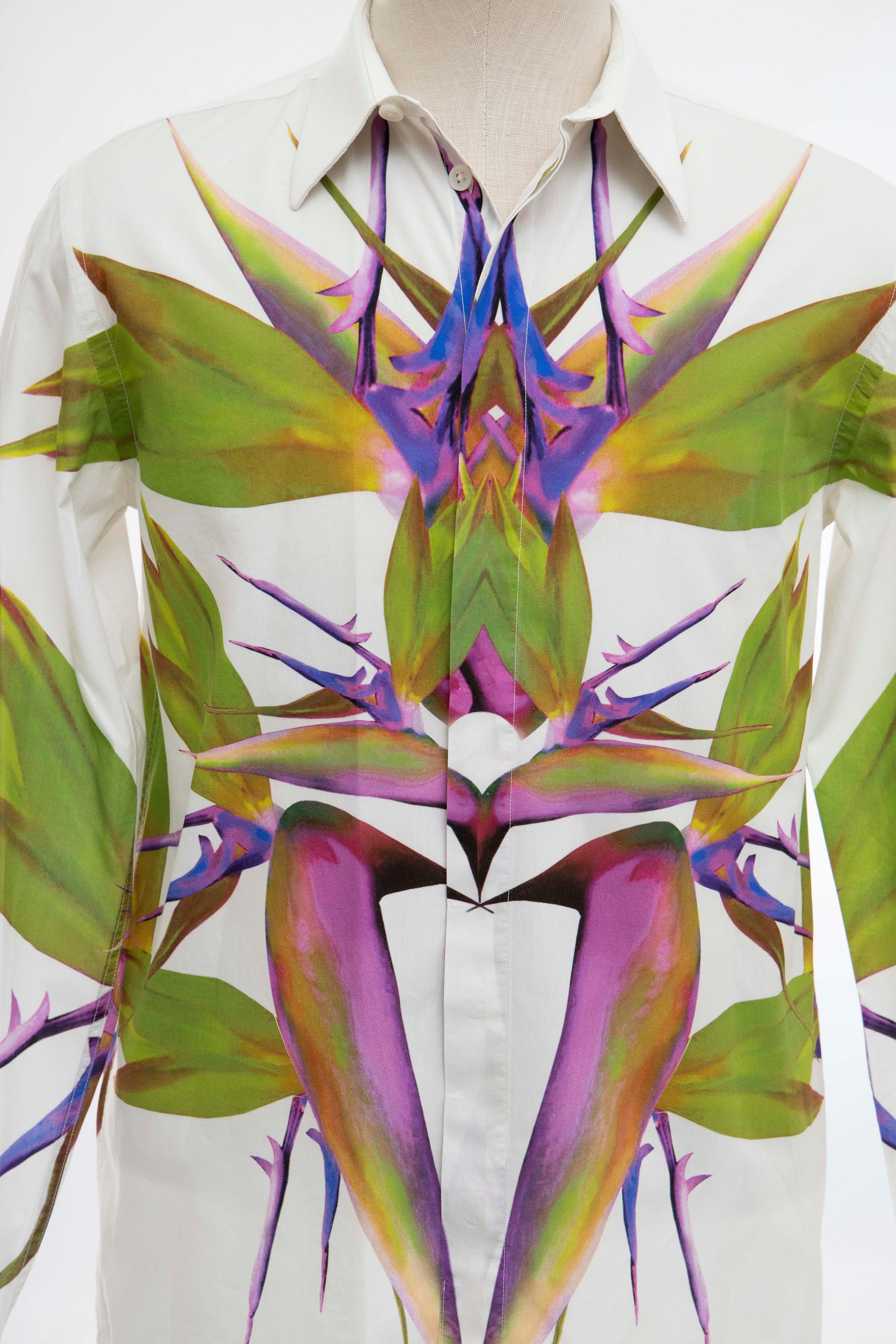 Riccardo Tisci for Givenchy, Runway Spring-Summer 2012, men's white cotton button front shirt with birds of paradise print, point collar,single button barrel cuffs and extra buttons.

EU. Small

Chest: 39, Length: 29, Sleeve: 25.5, Neck: