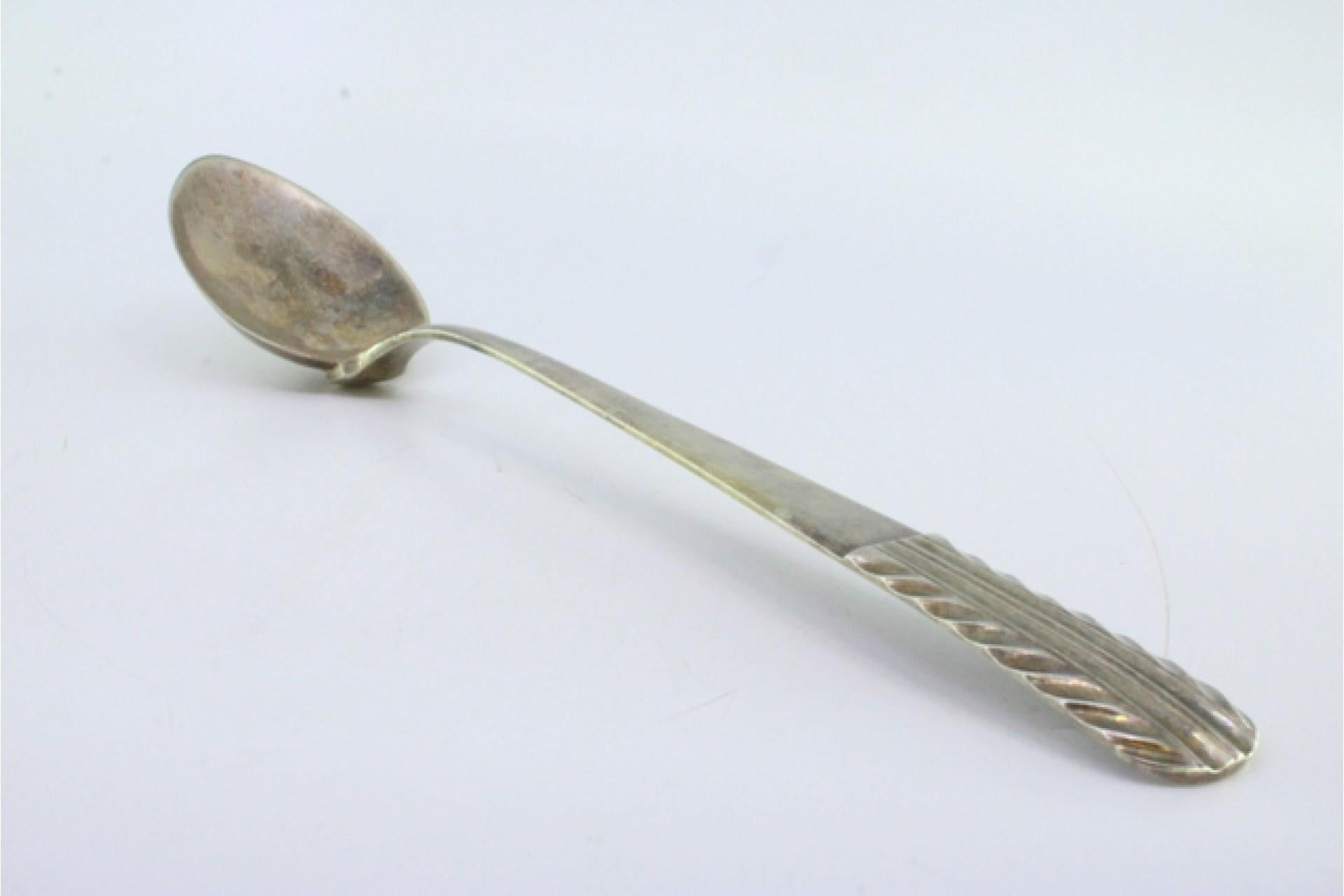 Rice spoon and serving with reliefs and grooves on the handle Europeo en venta