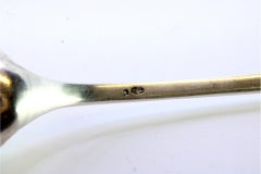 Rice spoon & serving platter in silver w/ reliefs & applications on the handle
