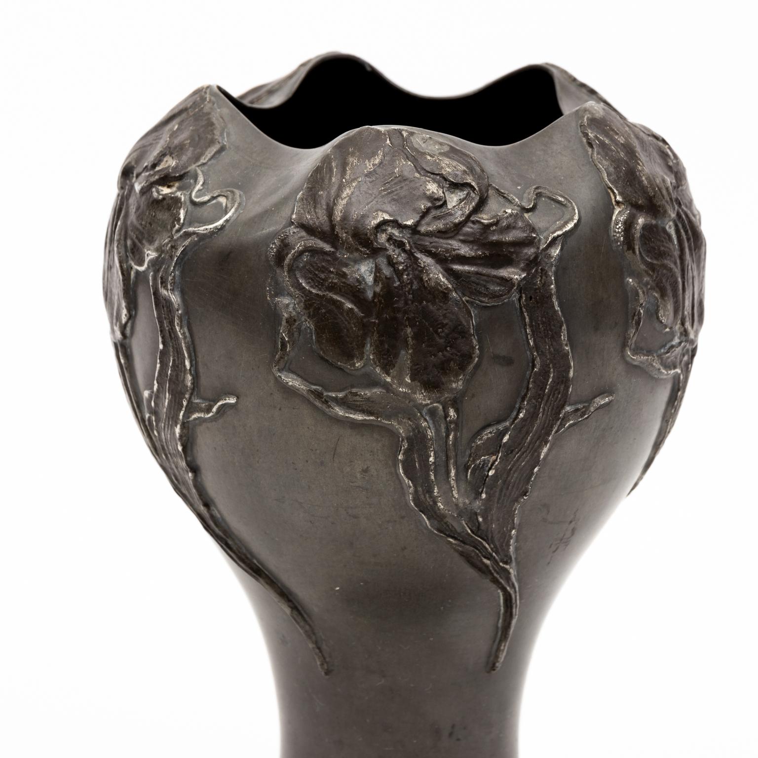 Circa 1900 Ricezinn German pewter with Art Nouveau designed florals. Signed. Please note of wear consistent with age.