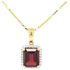 Rich Almandine Garnet and Diamond Pendant in 18kt Yellow Gold